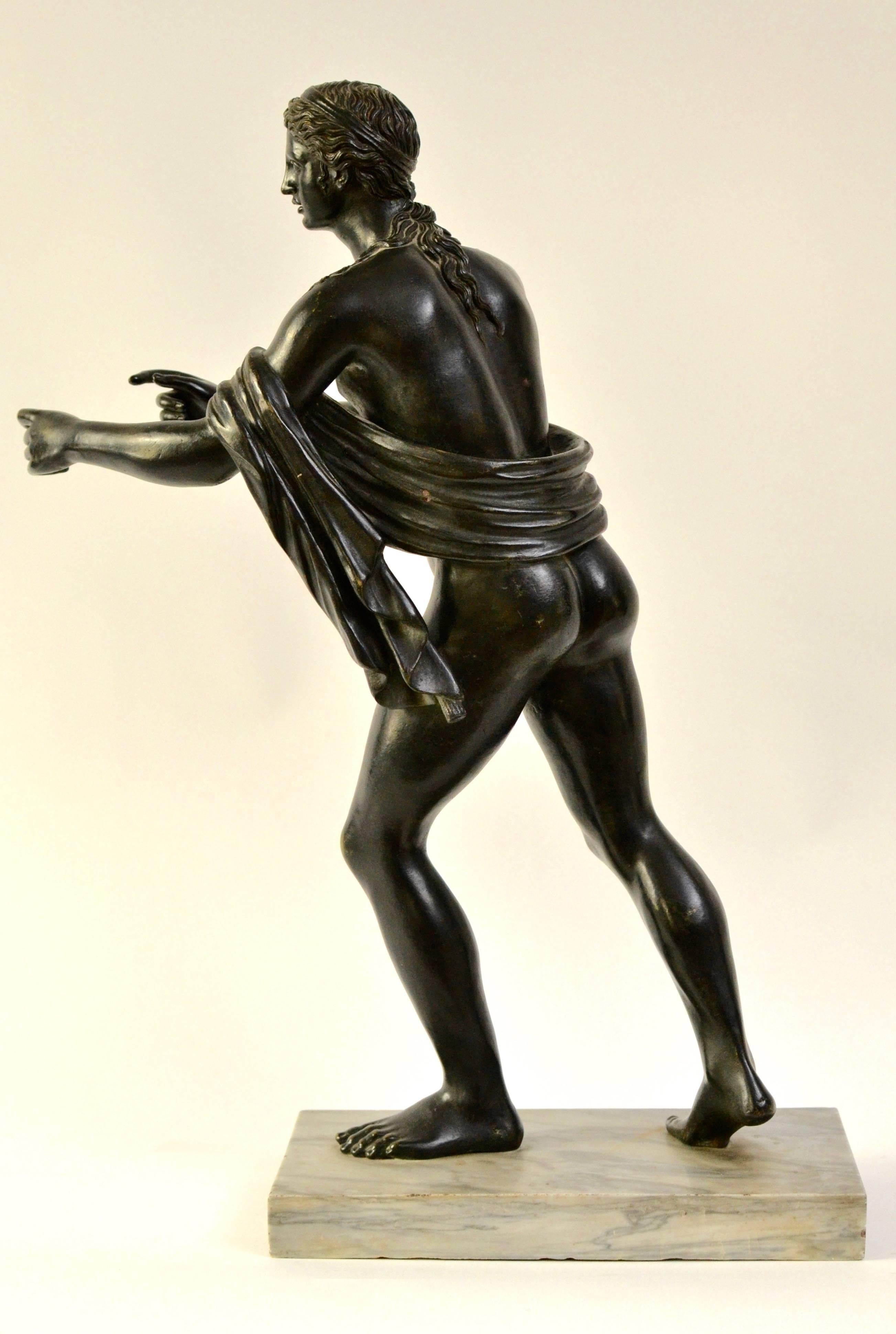 A late 18th century or early 19th century Italian Grand Tour bronze sculpture of Apollo from a model found in Pompeii. This is a unusual model to be found as a Grand Tour model.