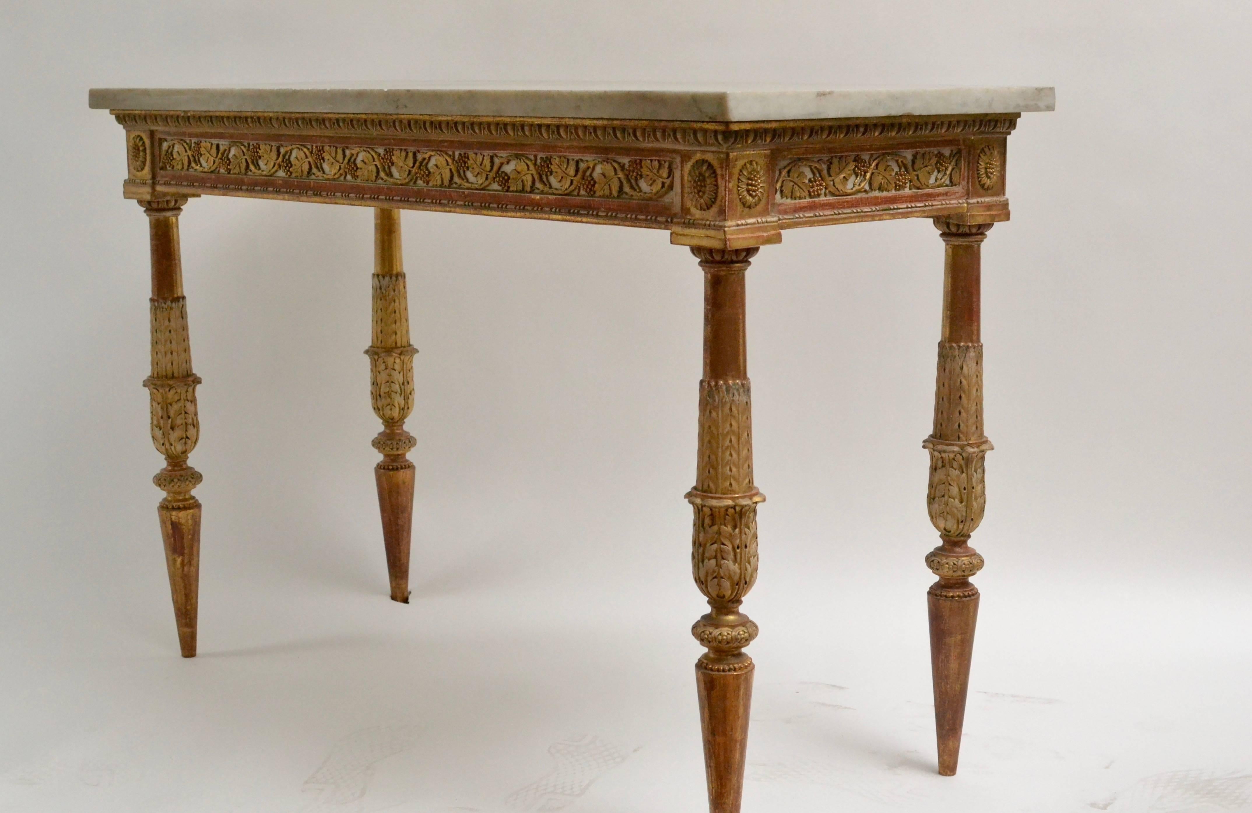 An important Gustavian carved giltwood console table with a marble top by Jean Baptiste Masreliez (1753-1801). After drawings by his brother the royal interior decorator Louis Masreliez (1748-1810). The detailing to carving and gilding is
