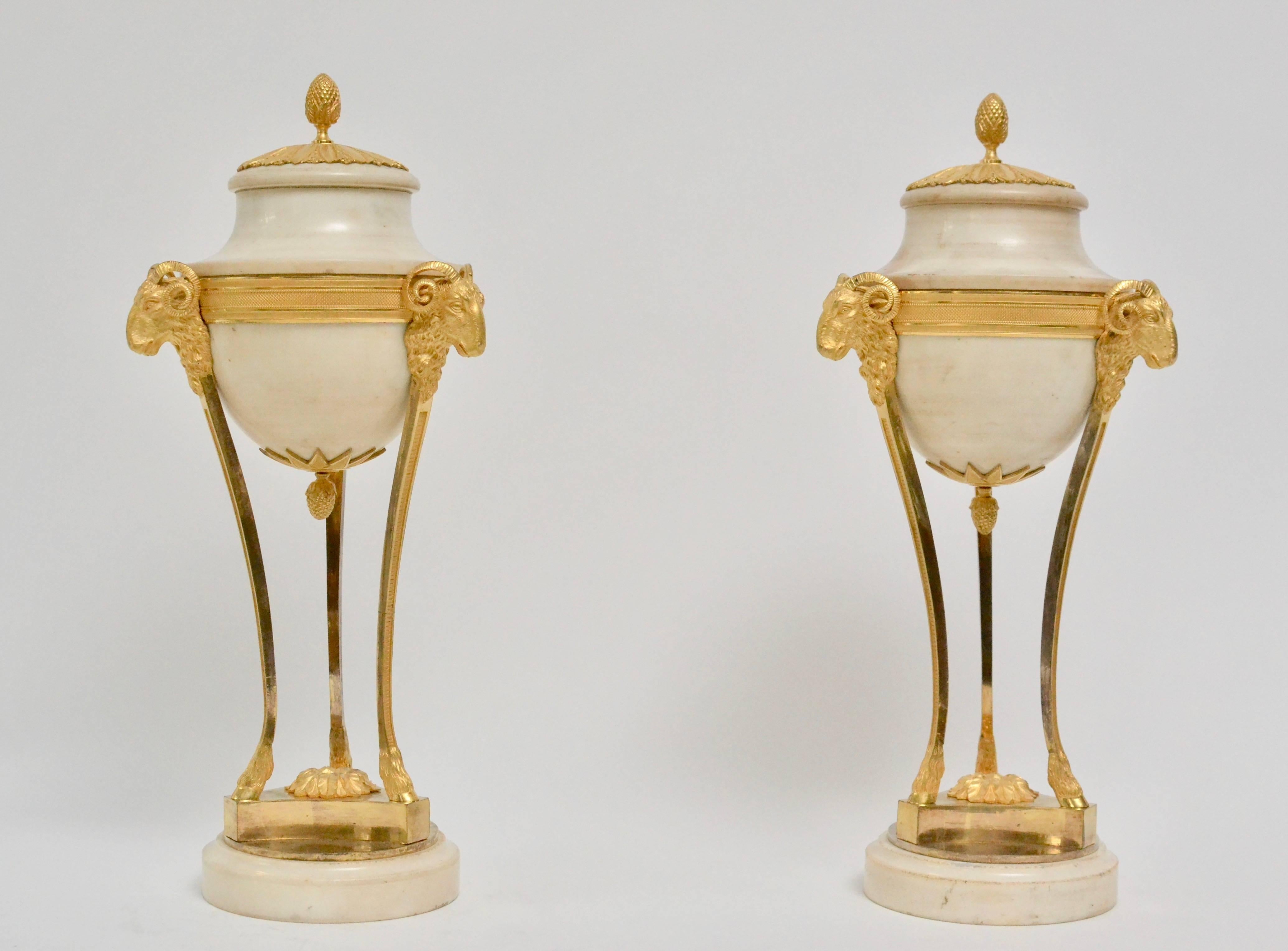 A fine pair of Louis XVI gilt bronze and white marble bronzes, late 18th century.