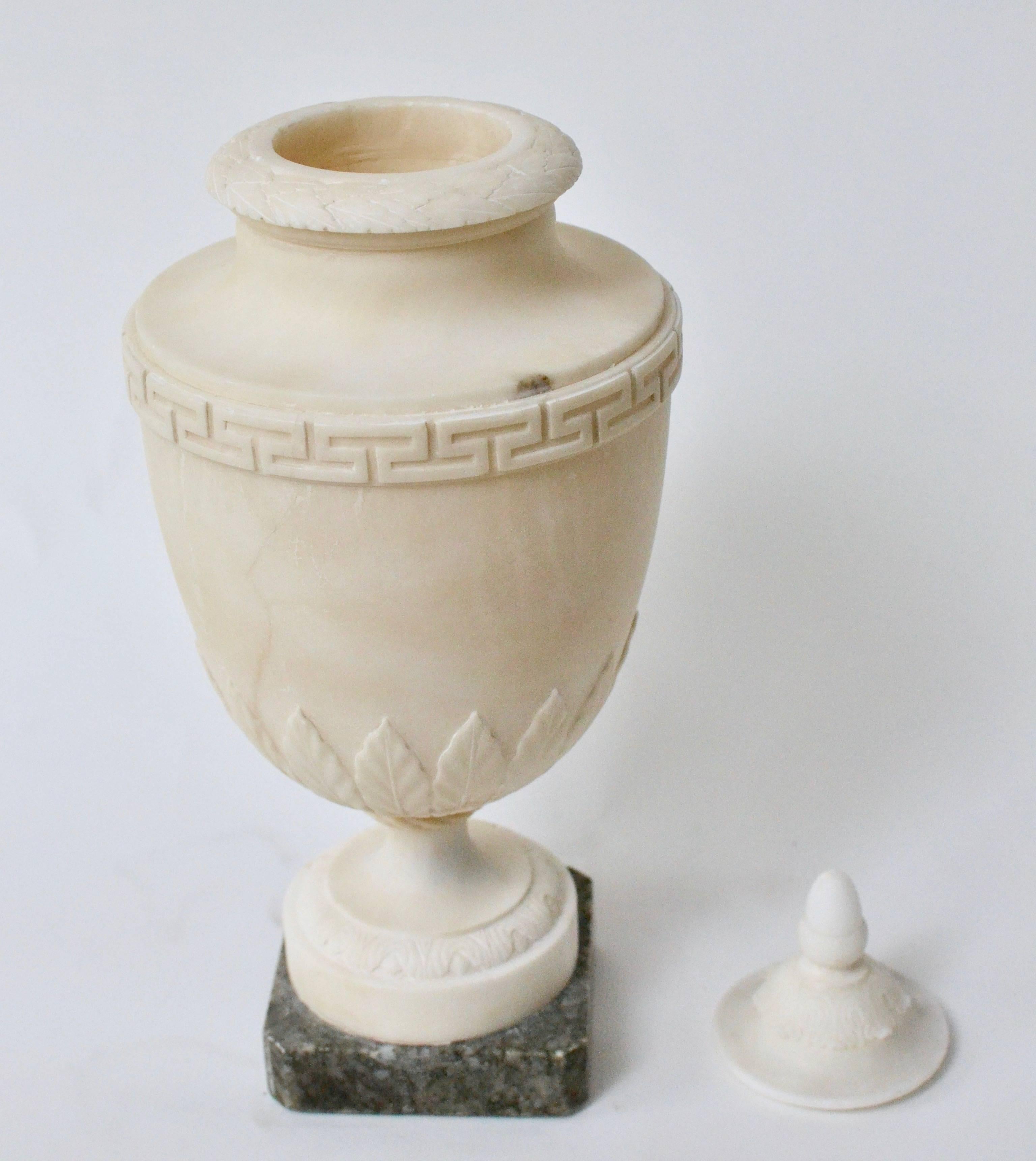 An early 19th century alabaster urn.