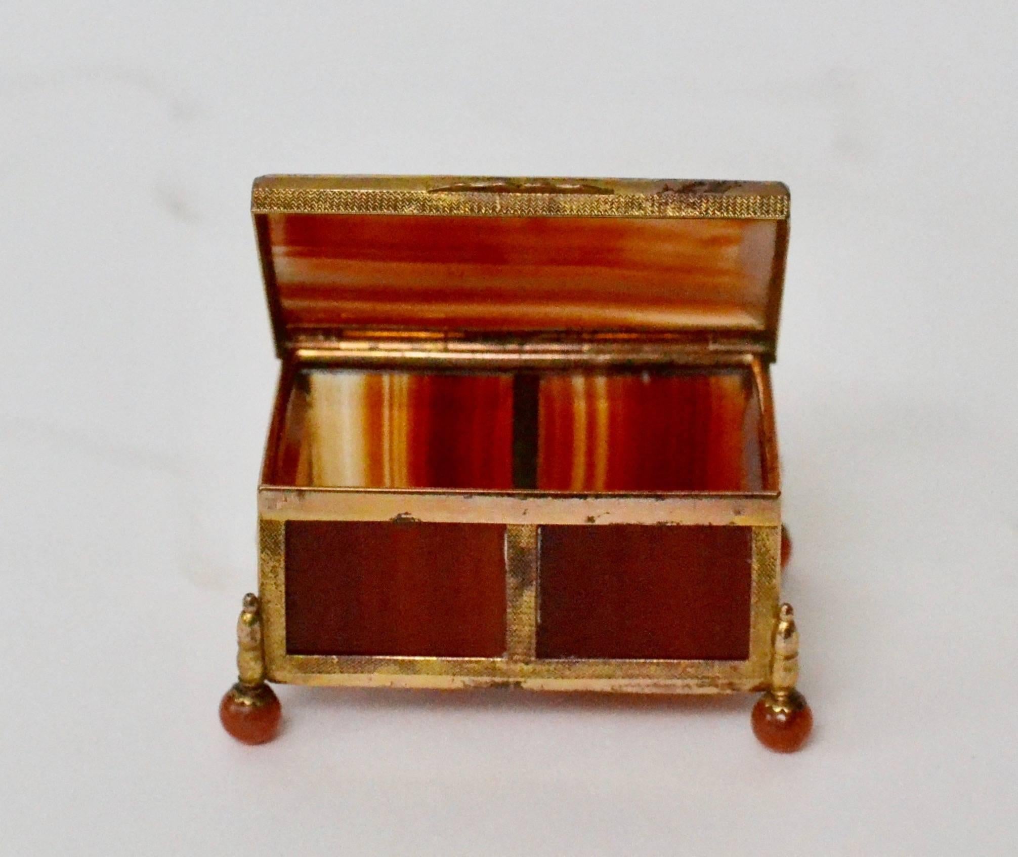 A small 19th century gilt bronze and agate box, 19th century.