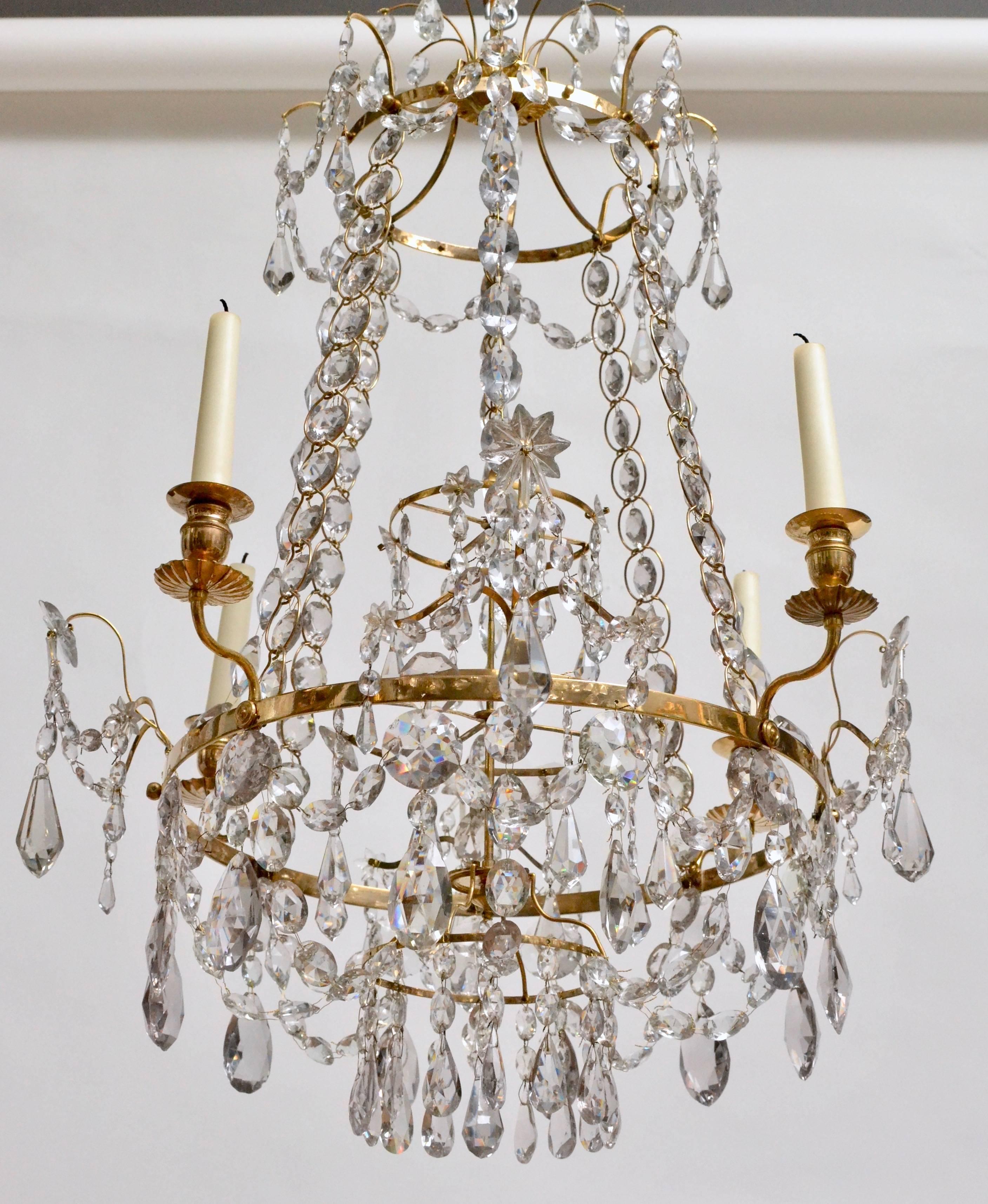 A rare Gustavian Haga chandelier attributed to Olof Westerberg (1750-1817); Stockholm. Gilt bronze and crystals.