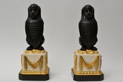 Pair of Patinated Bronze Lions with Shield on Ormolu-Mounted White Marble Bases