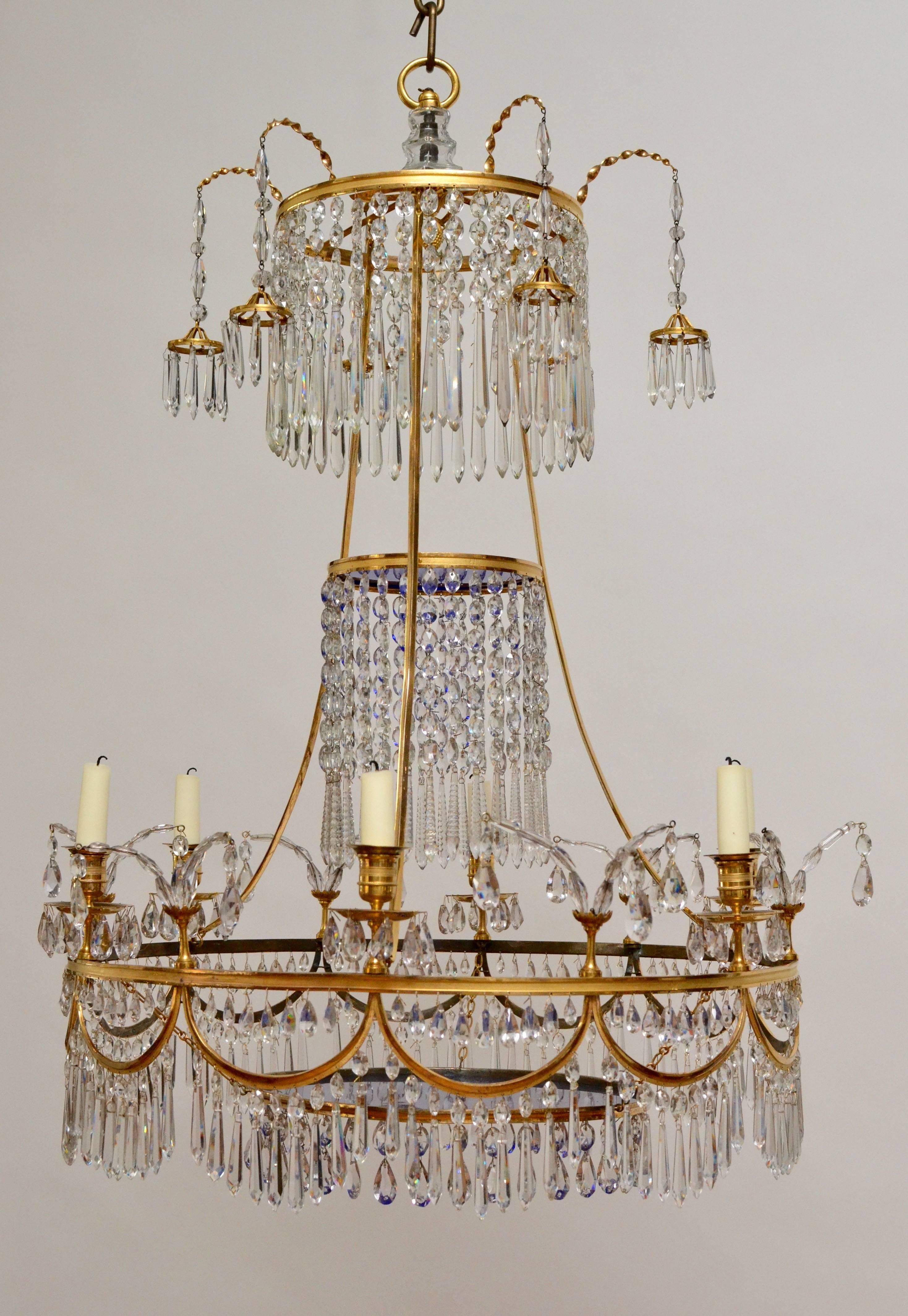 A German gilt bronze Louis XVI chandelier attributed to Werner & Mieth, late 18th century. Blue glass at the top and in the bottom.