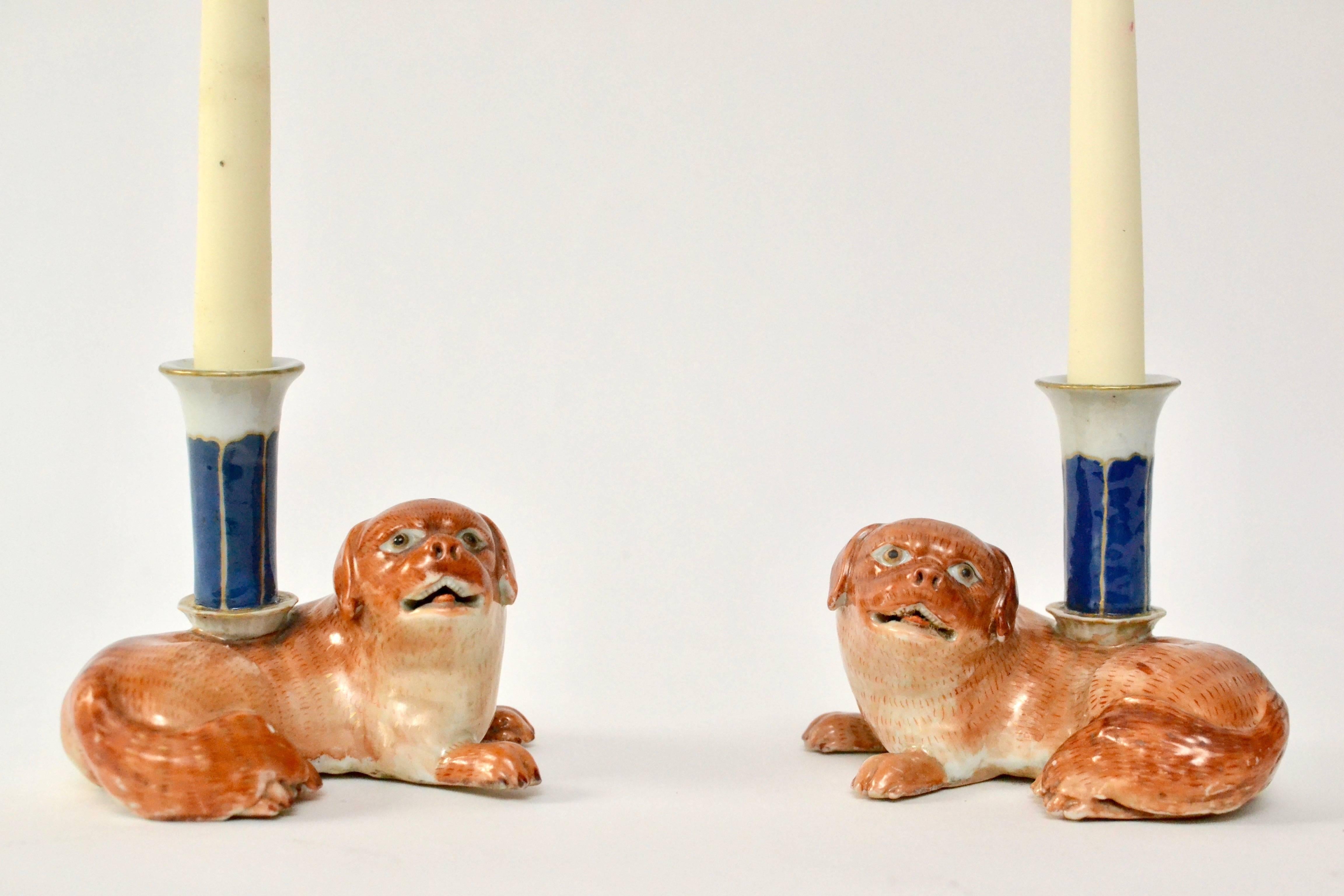 A pair of late 18th century, Chinese export porcelain dog-form candlesticks.