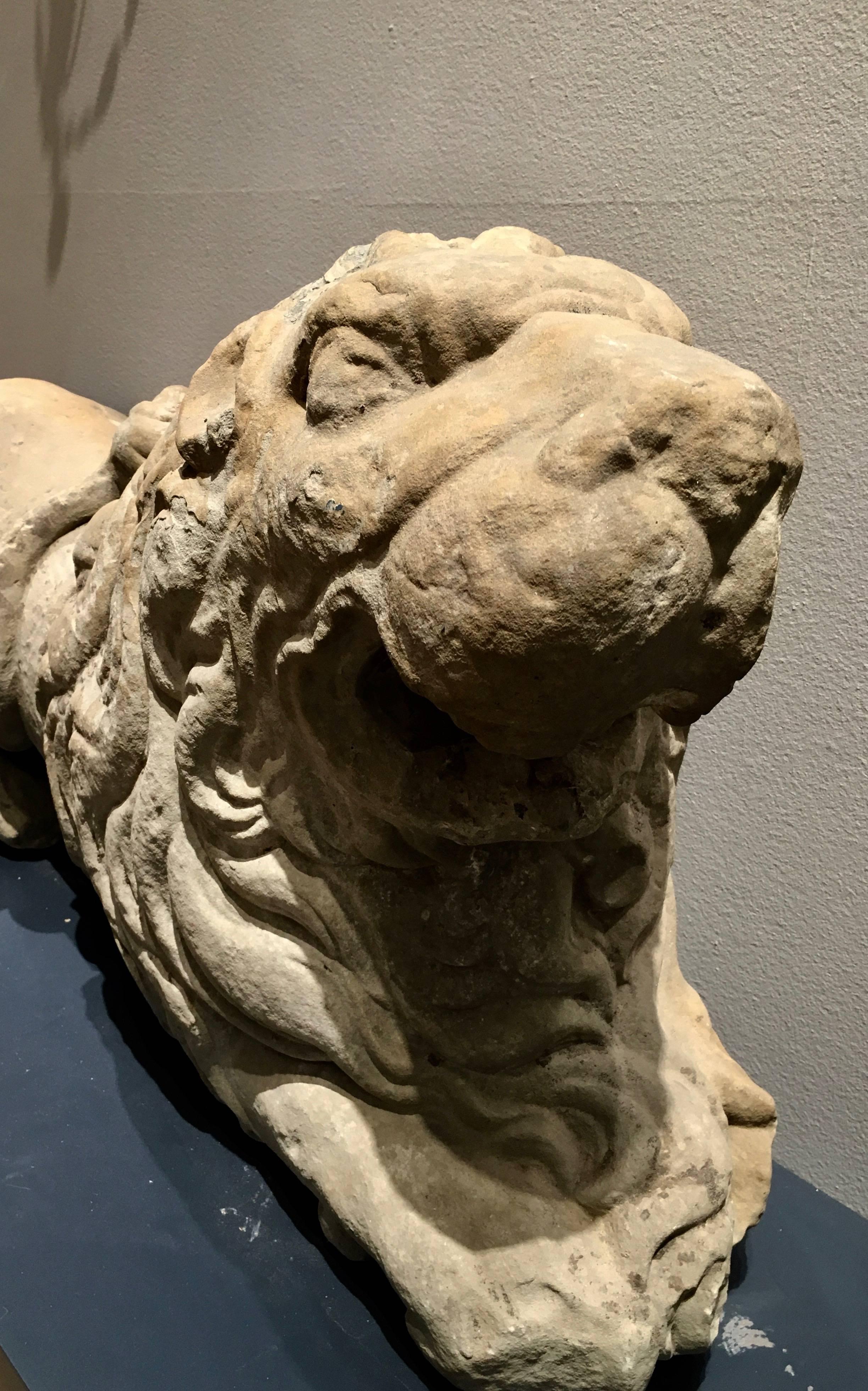 Pair of 17th Century Carved Sandstone Reclining Lions Originally Part of the 5