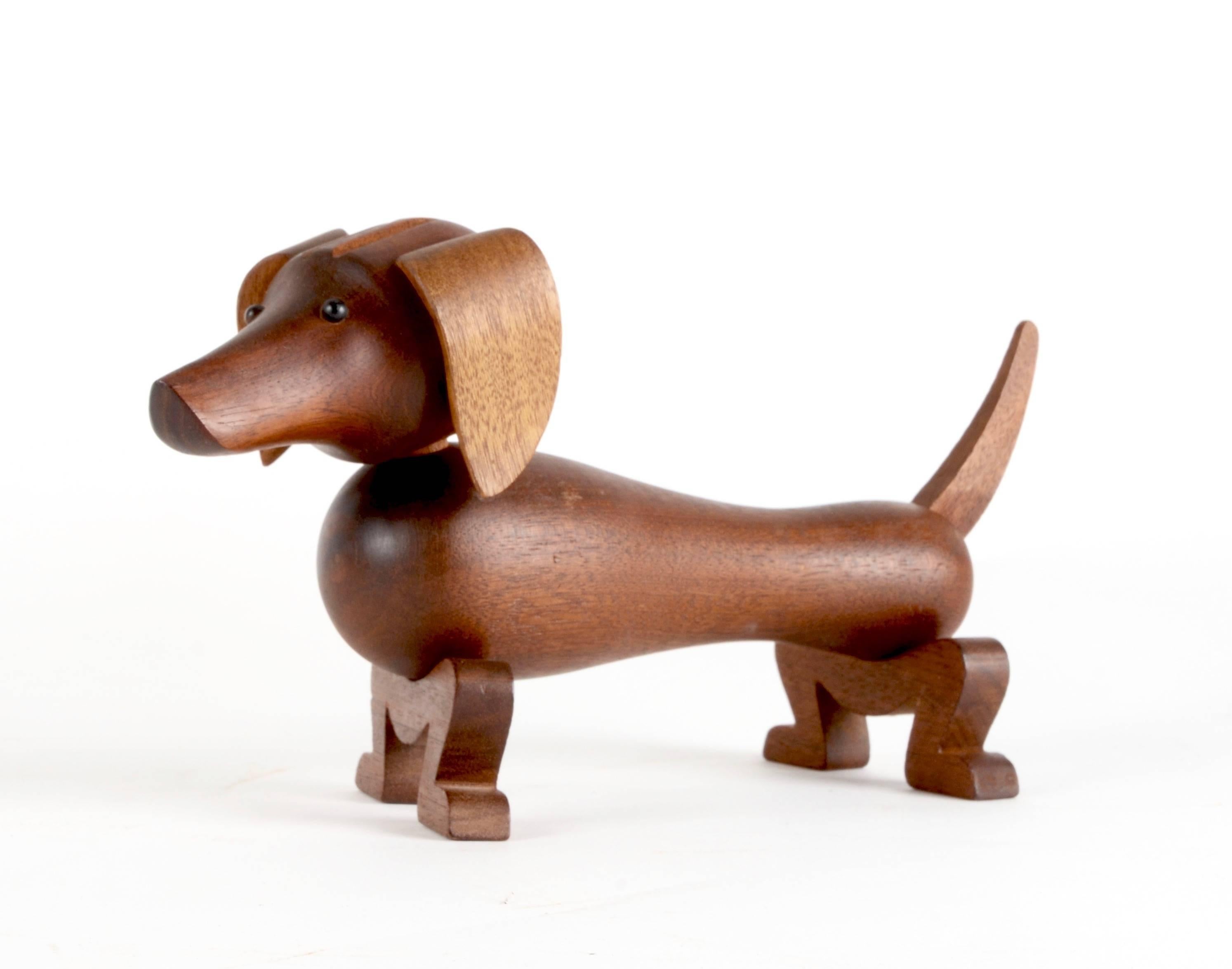 Toy dog, Dachshund / Gravhunden Pind in mahogany, designed by Kay Bojesen in 1934. 

