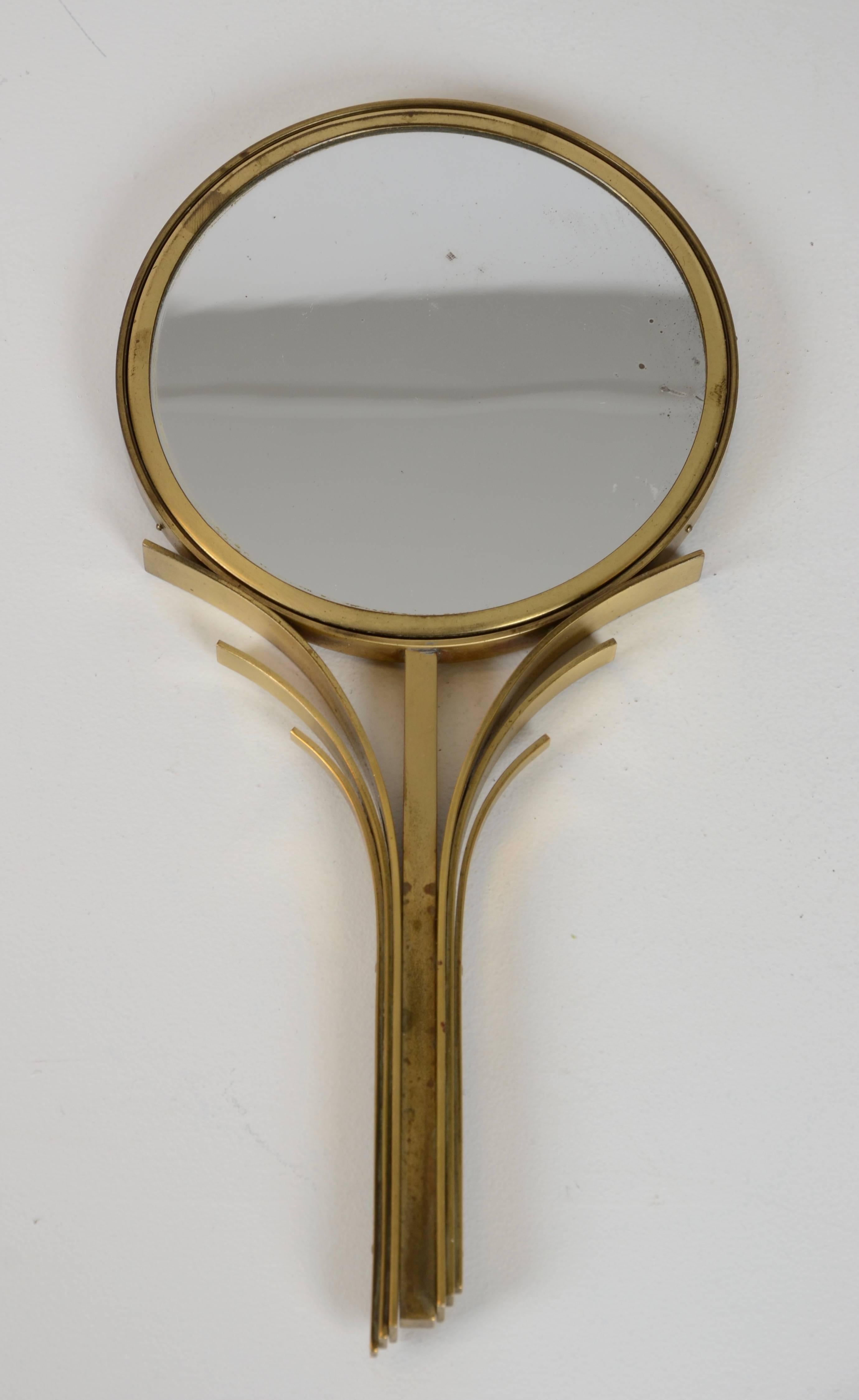 Hand mirror in brass, designed by Ivar Ålenius-Björk for Ystad Metall, Sweden, 1930s.