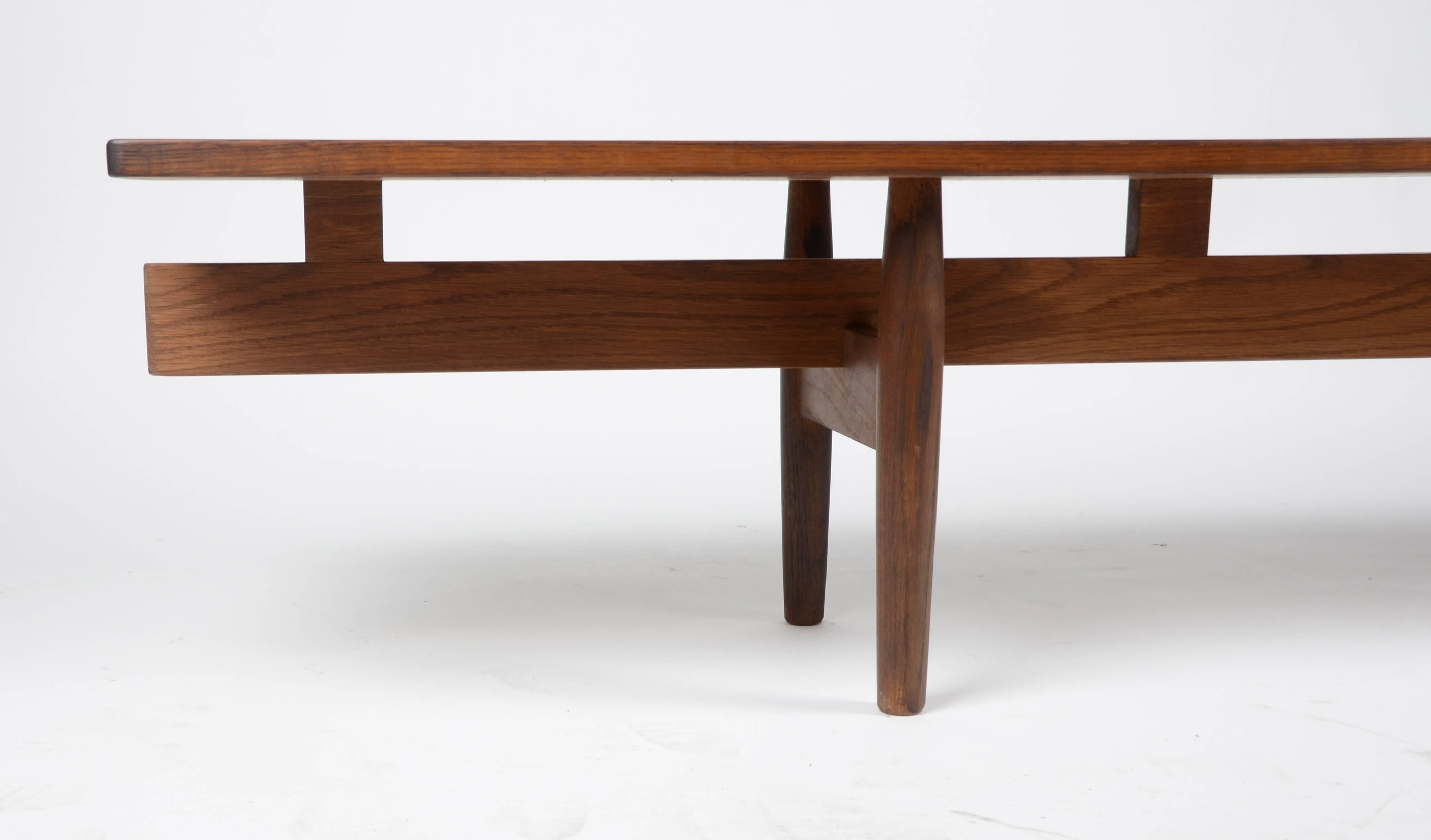 Long bench in rosewood, model Long Banc. Attributed Ib Kofod-Larsen, Denmark, 1960s. 

Measures: Length, circa 118.11 inches/ 300 cm. 

Good condition.