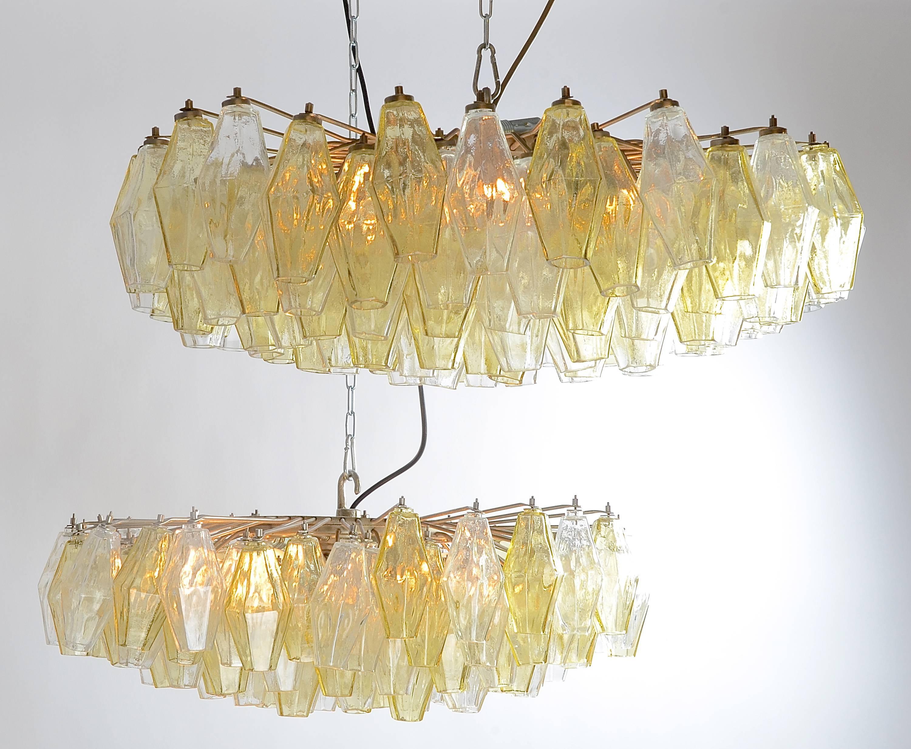 A pair of suspension lamps, model Poliedri in yellow and clear transparent glass. Designed by Carlo Scarpa for Venini. Marked 
