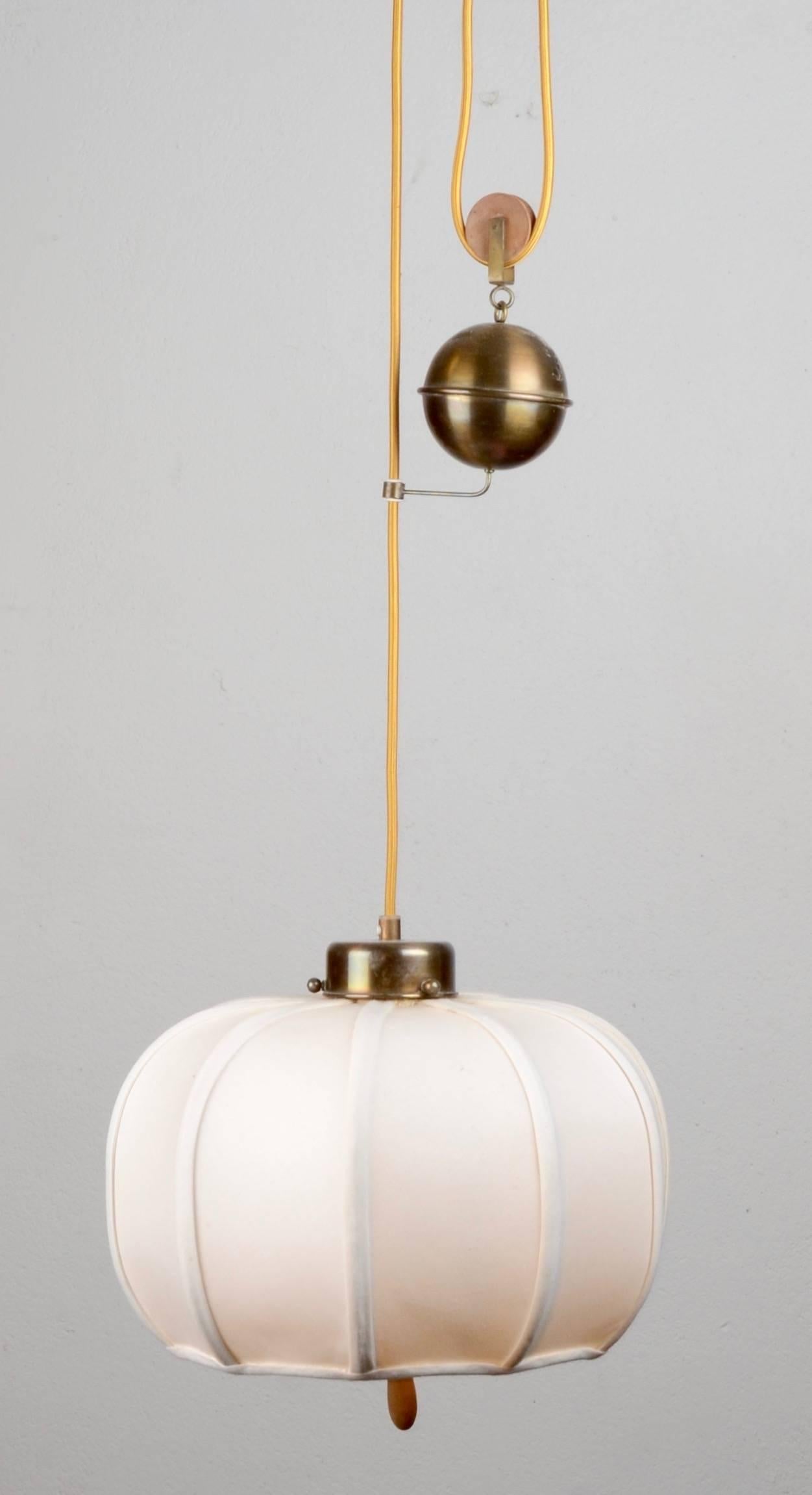 Pendant designed by Josef Frank for Firma Svenskt Tenn, Sweden, 1930s-1940s. Easy to adjust the height of the lamp with the help of the weight.