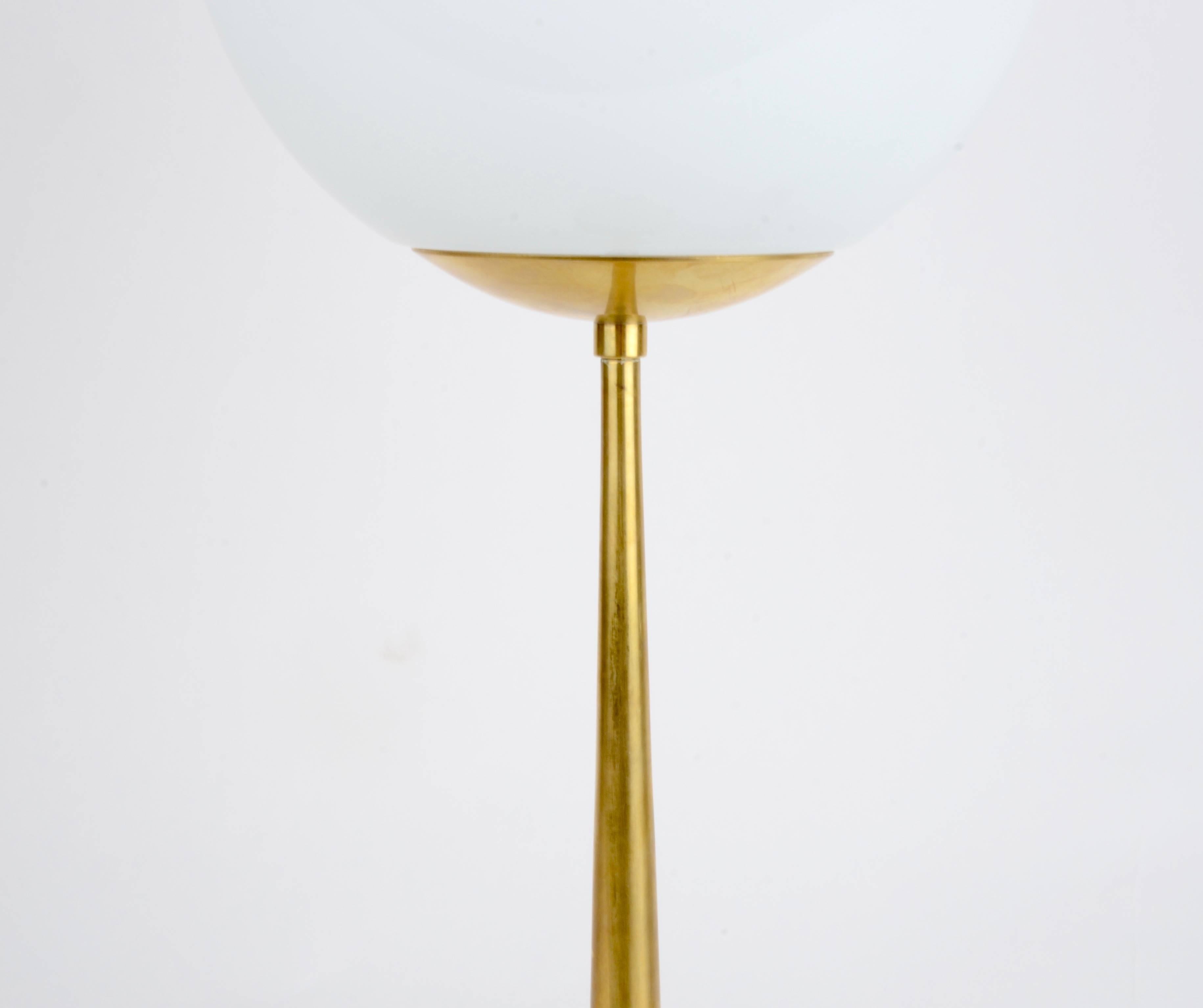 A table lamp in brass with glass shade designed by Hans-Agne Jakobsson, Markaryd, Sweden, mid-1900s.