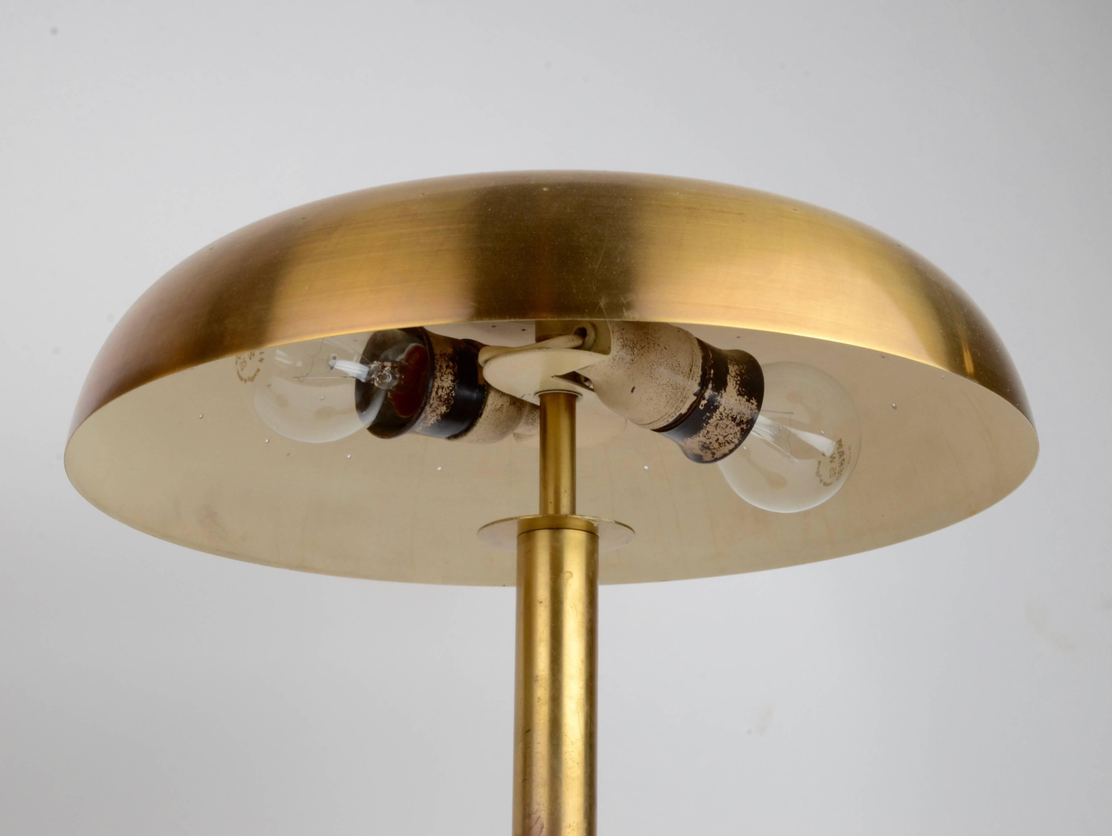 A pair of table lamps in brass, designed by Bertil Brisborg for NK (Nordiska Komapniet), Sweden 1950s. Signed with impressed manufacturer's mark to underside: [B8405.