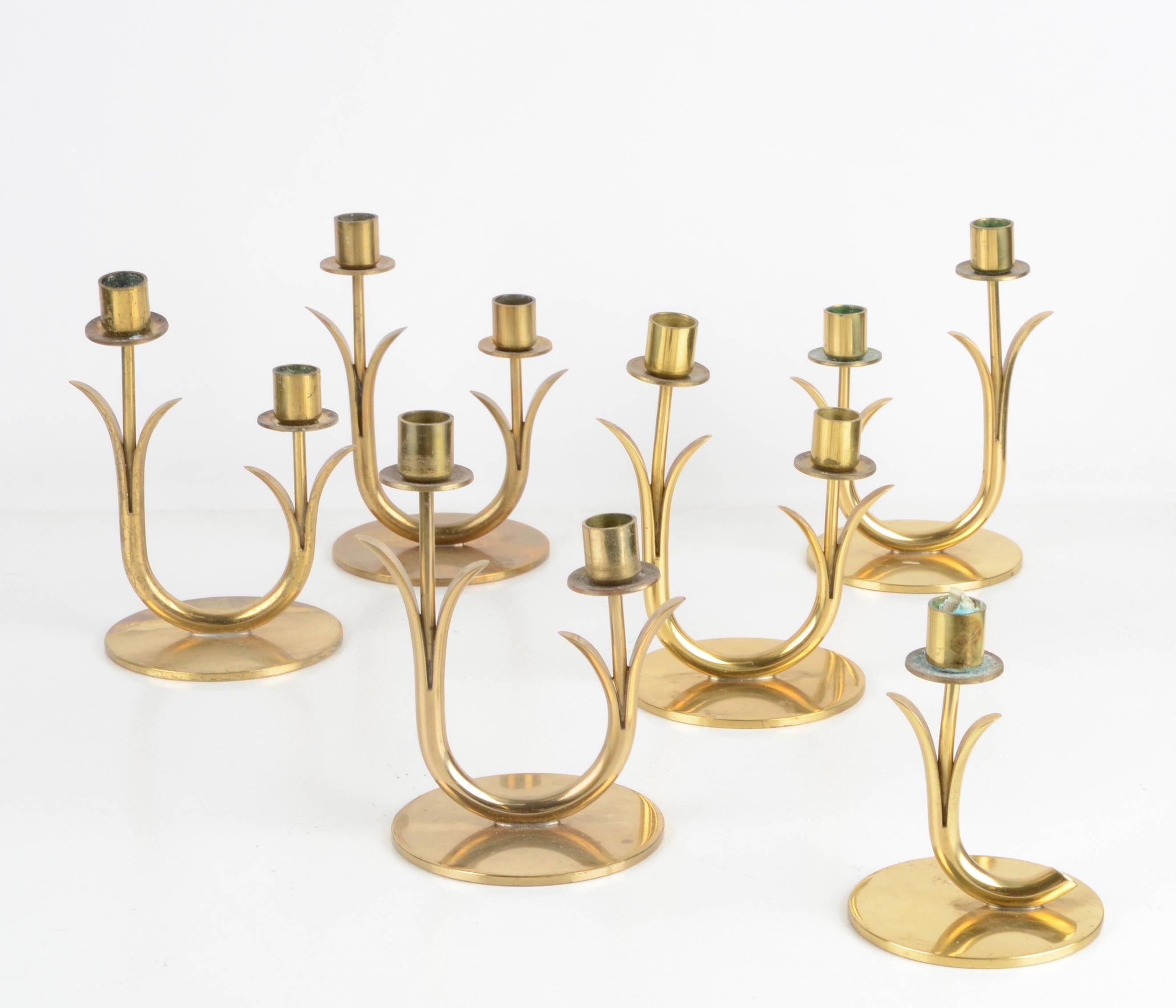 A set of six candleholders in brass, designed by Gunnar Ander for Ystad Metall, Sweden, mid-1900s.