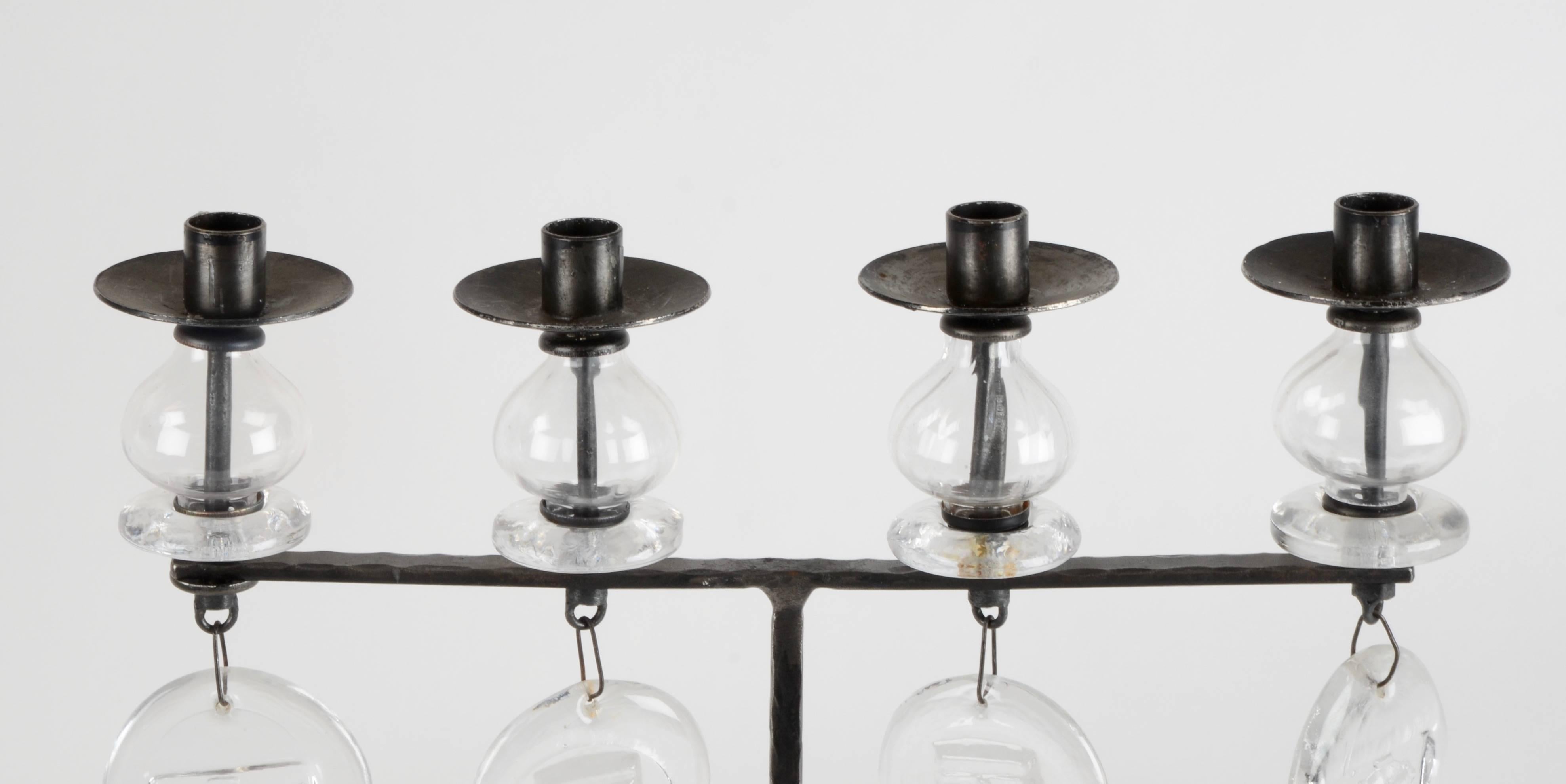 Candelabra in cast iron and art glass, designed by Erik Hoglund for Boda. Sweden, 1960´s.