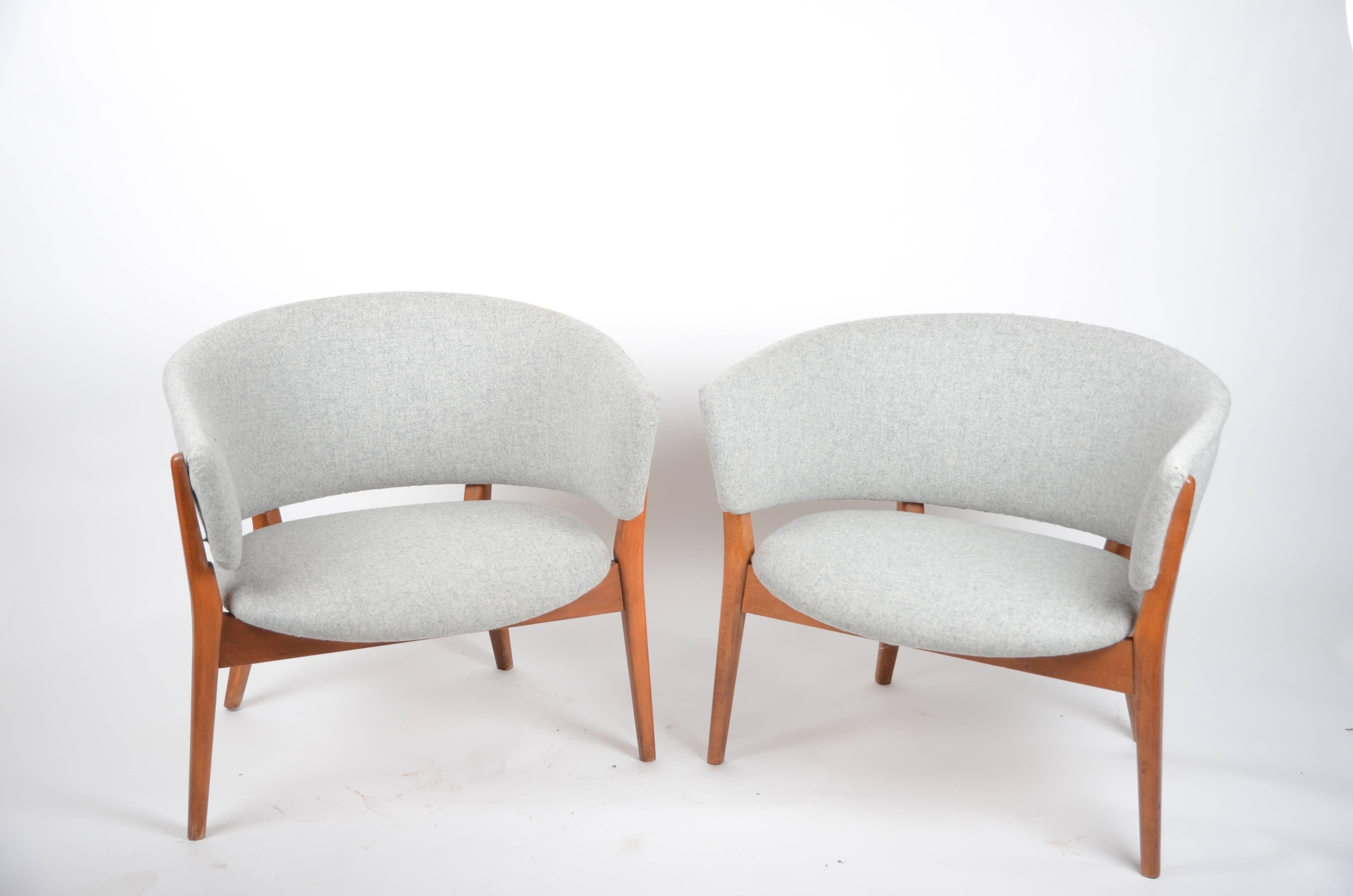 A pair of armchairs designed by Nanna Ditzel, 1952, model ND 83. Reupholstered in wool fabric.