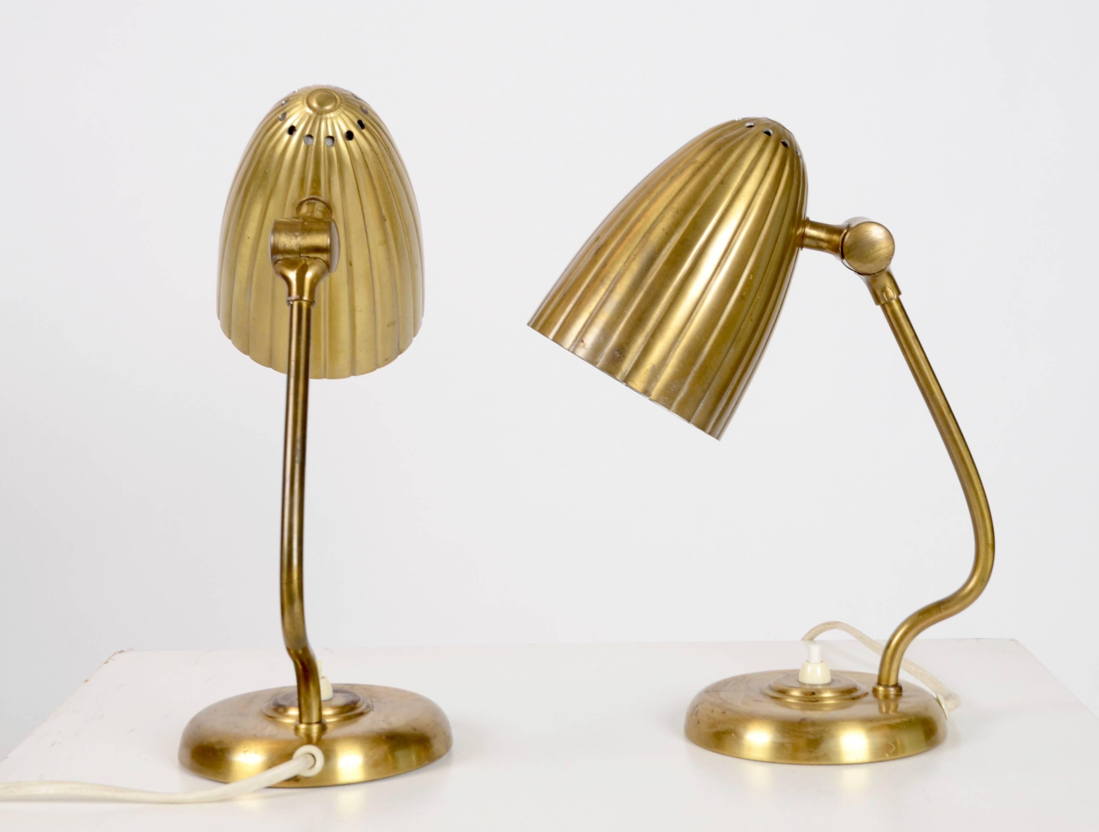 A pair of table lamps in brass, made by Böhlmarks, Sweden, 1940s.