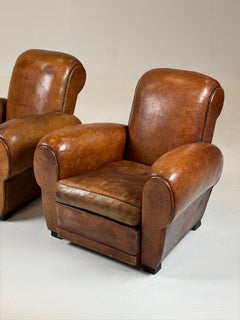 Antique leather club chairs, 1930–1940