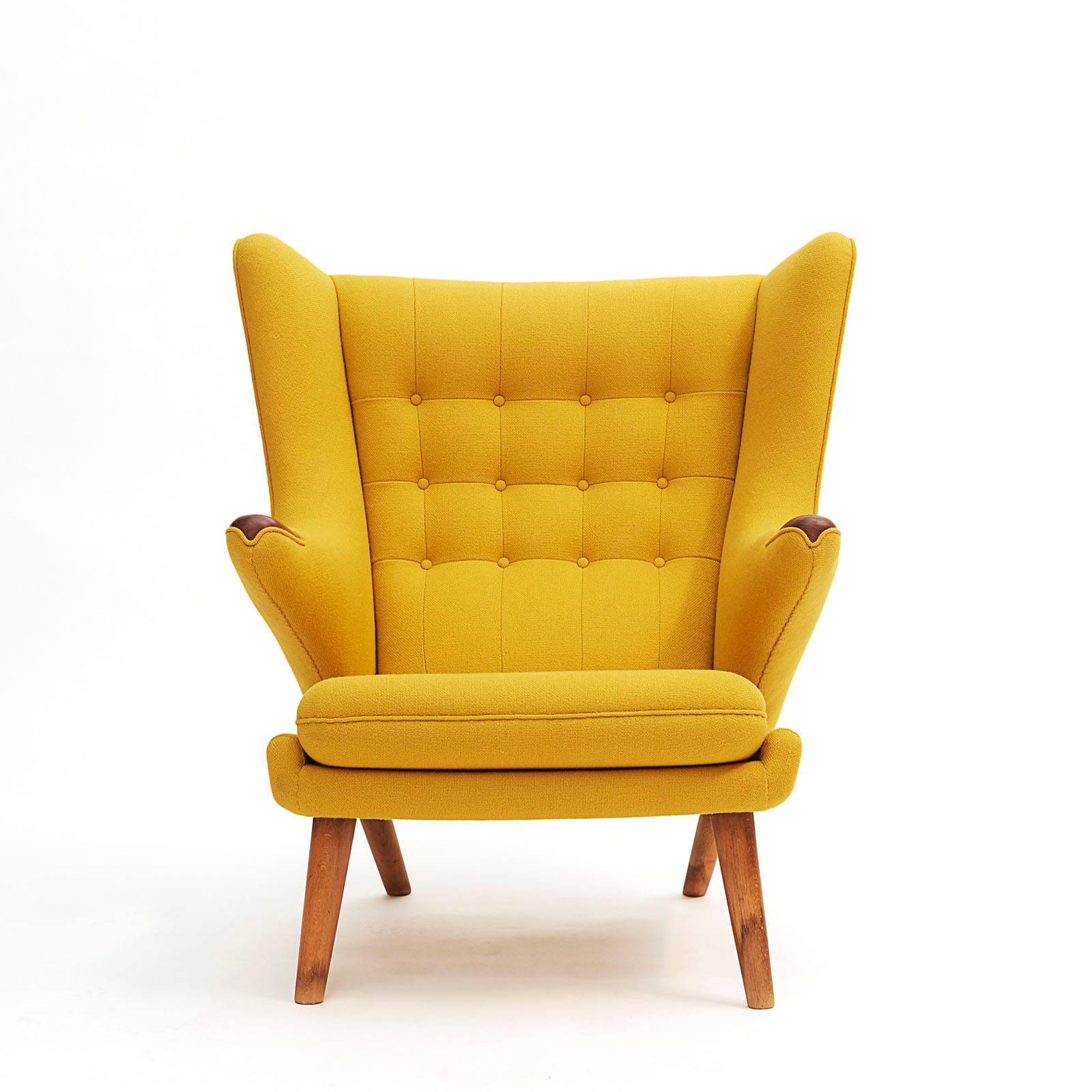 A Hans J. Wegner Papa Bear chair "Bamsestolen" mid-20th century, with teak arms and legs, re-upholstered in vibrant yellow Kvardrat wool fabric. One of the most iconic and comfortable chairs you can sit in.