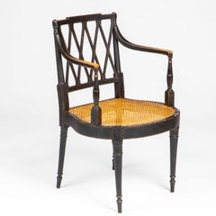 Pair of English Regency Armchairs in Ebonized Beech with Caned Seats