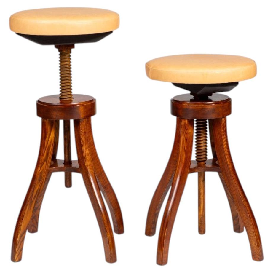 Pair of Fritz Hansen Adjustable Stools in Solid Oak with Light Leather For Sale