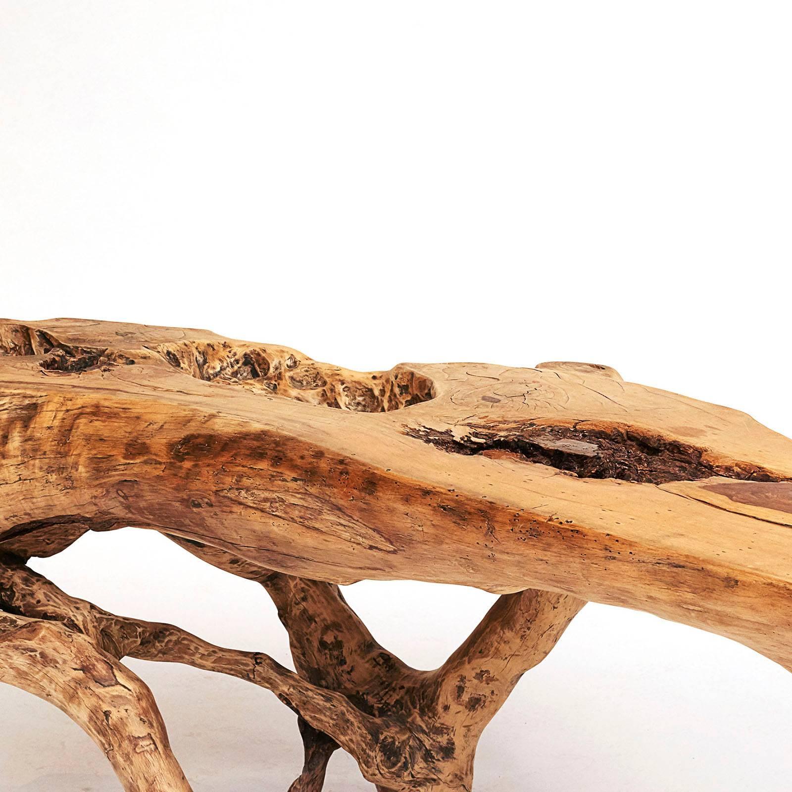 A beautiful free-form Narra 18th-19th century wood table that would make a statement centre table in any setting. Recently crafted into a table with the regional inspiration of the Philippine people.

