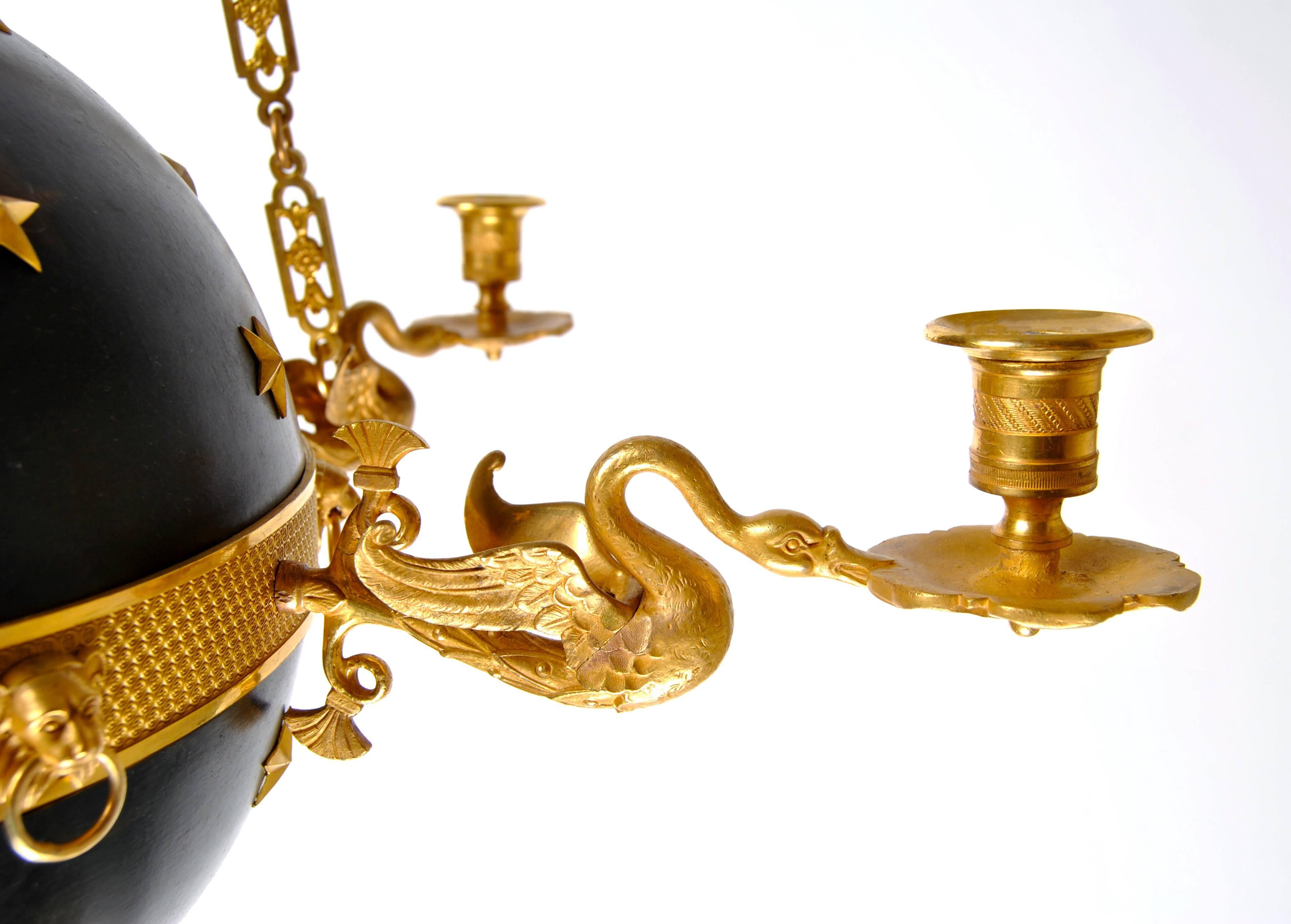 Unusual lamp in excellent condition made circa 1820. Beautifully ornamented with swans, lions and stars. 
