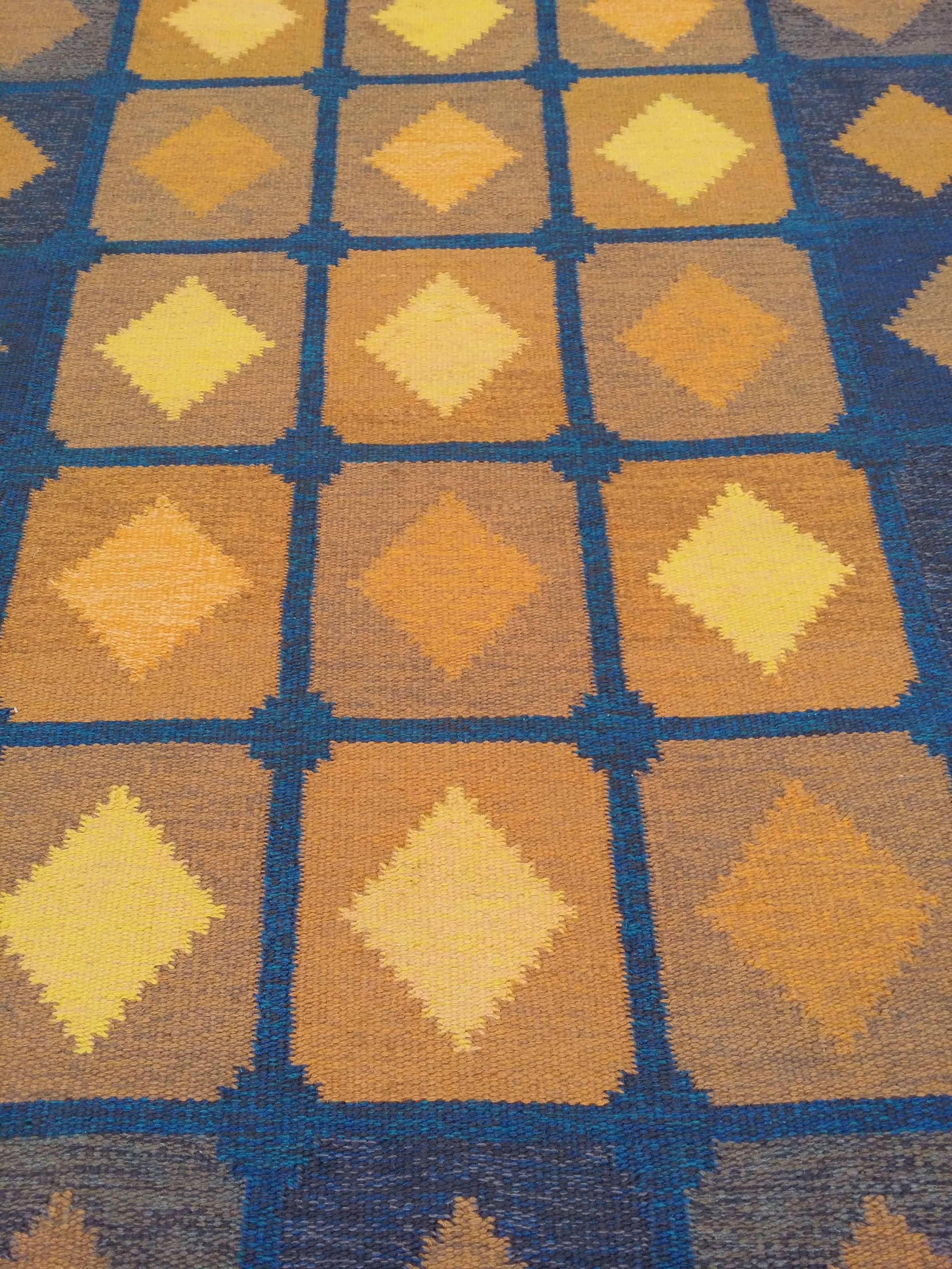 Squares with diamonds autumn. Swedish flatwoven rölakan rug composed by Birgitta Södergren .Warps : light beige linen yarn. Weft: wool,Z4-5 spun. Signed: BS. Technique : Warp slinging i.e. dovetail tapestry technique. Condition:Good,