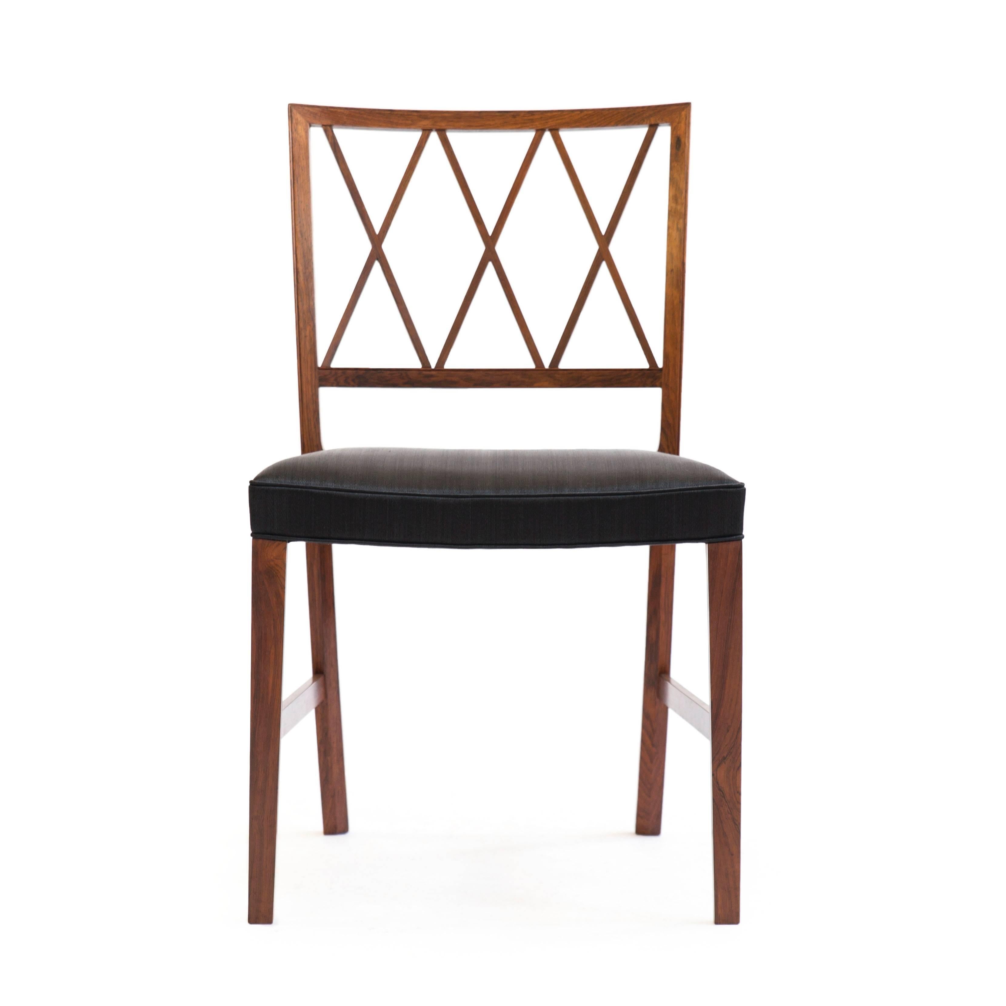 A set of four beautiful Ole Wanscher chairs. 

Frames of Brazilian rosewood, seats upholstered with black horsehairs. 

Executed by cabinetmaker A. J. Iversen, Denmark.