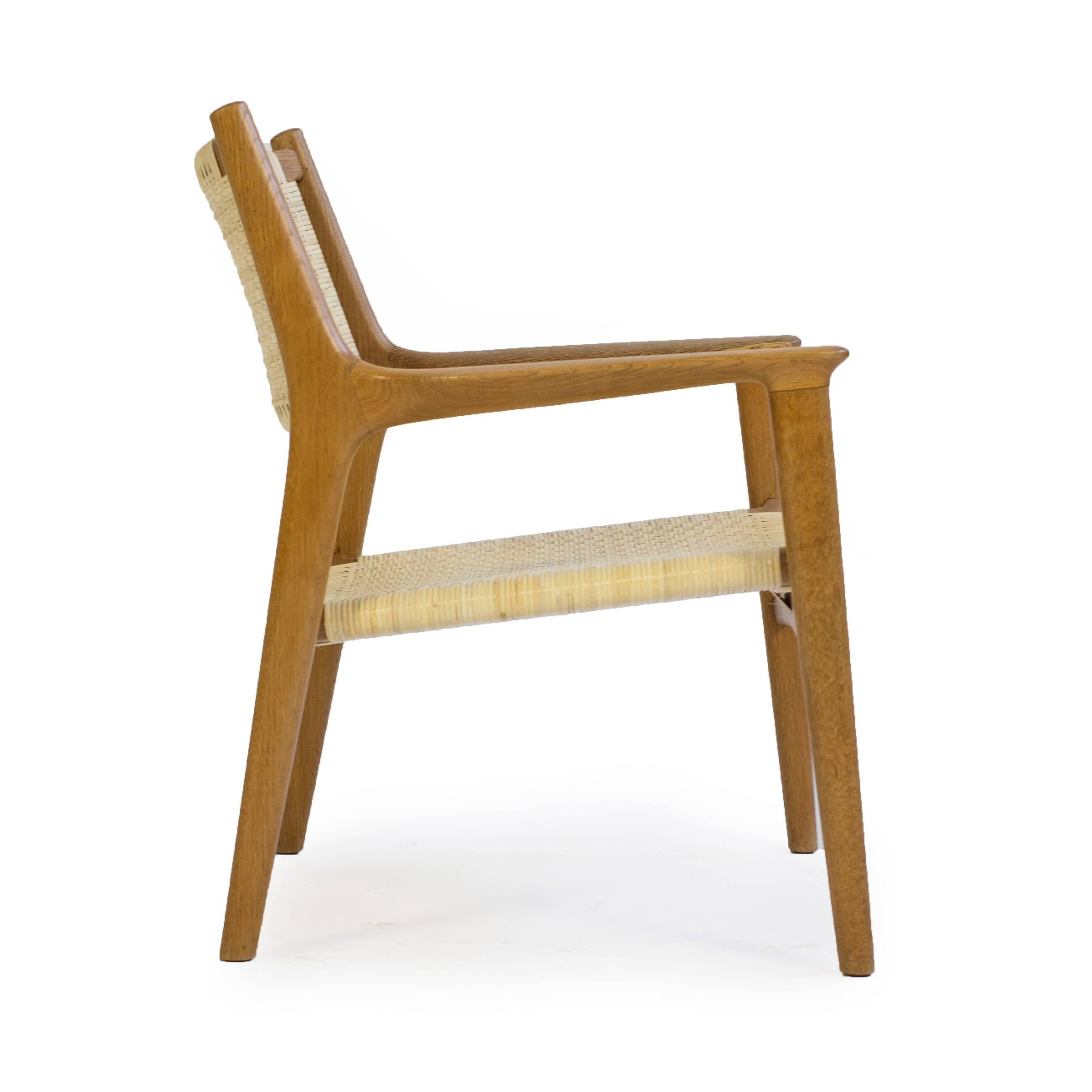 A rarely seen Hans J. Wegner oak arm chair. 

Seat and back with new woven cane

Designed by Hans J. Wegner 1951, executed by cabinetmaker Johannes Hansen, Denmark, model JH 516. 

Very fine restored condition. 