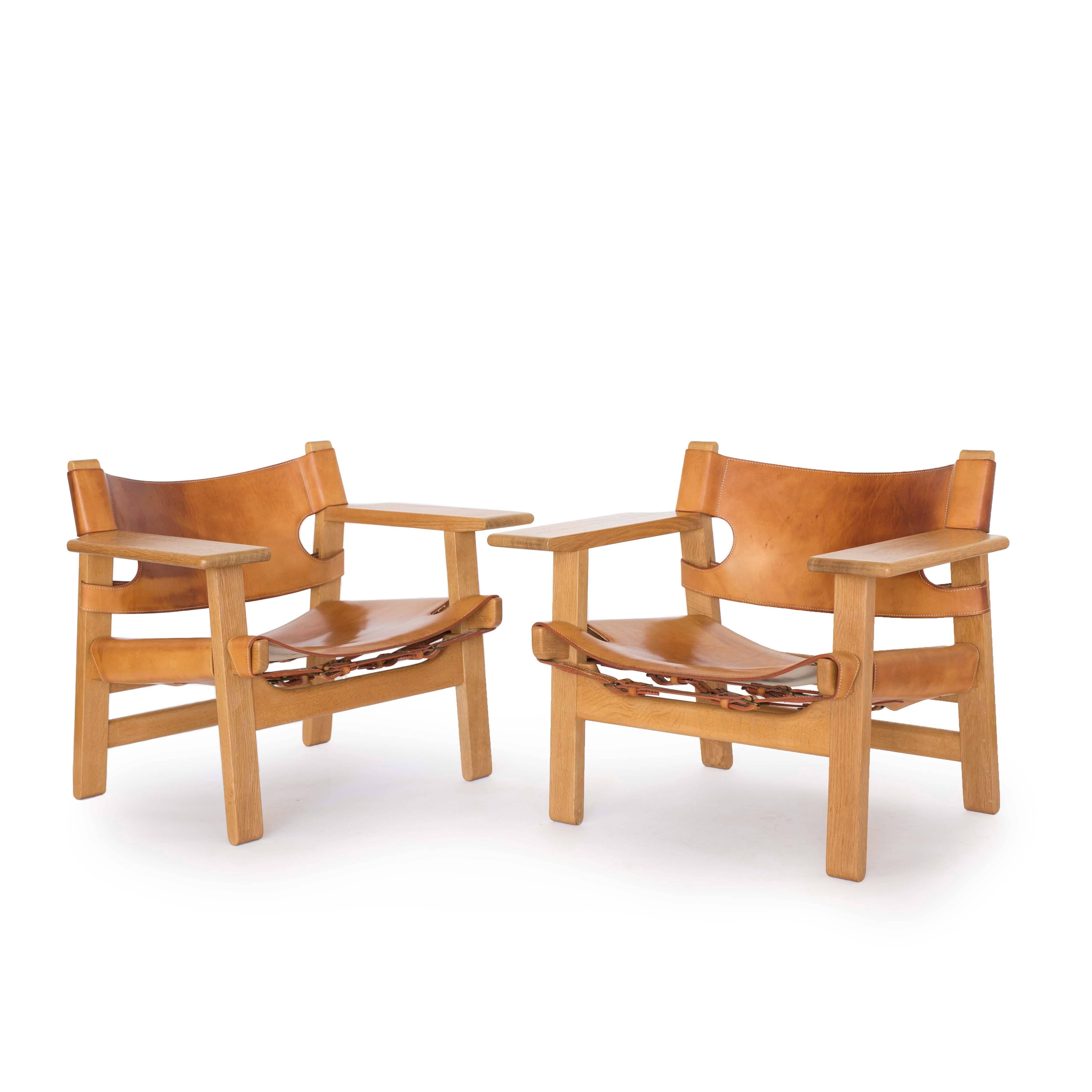 A pair of Børge Mogensen 'The Spanish chair' with frame of oak, seat and back with natural patinated butt leather. 

Designed 1958, manufactured by Fredericia Stolefabrik, Denmark, model 2226.

 