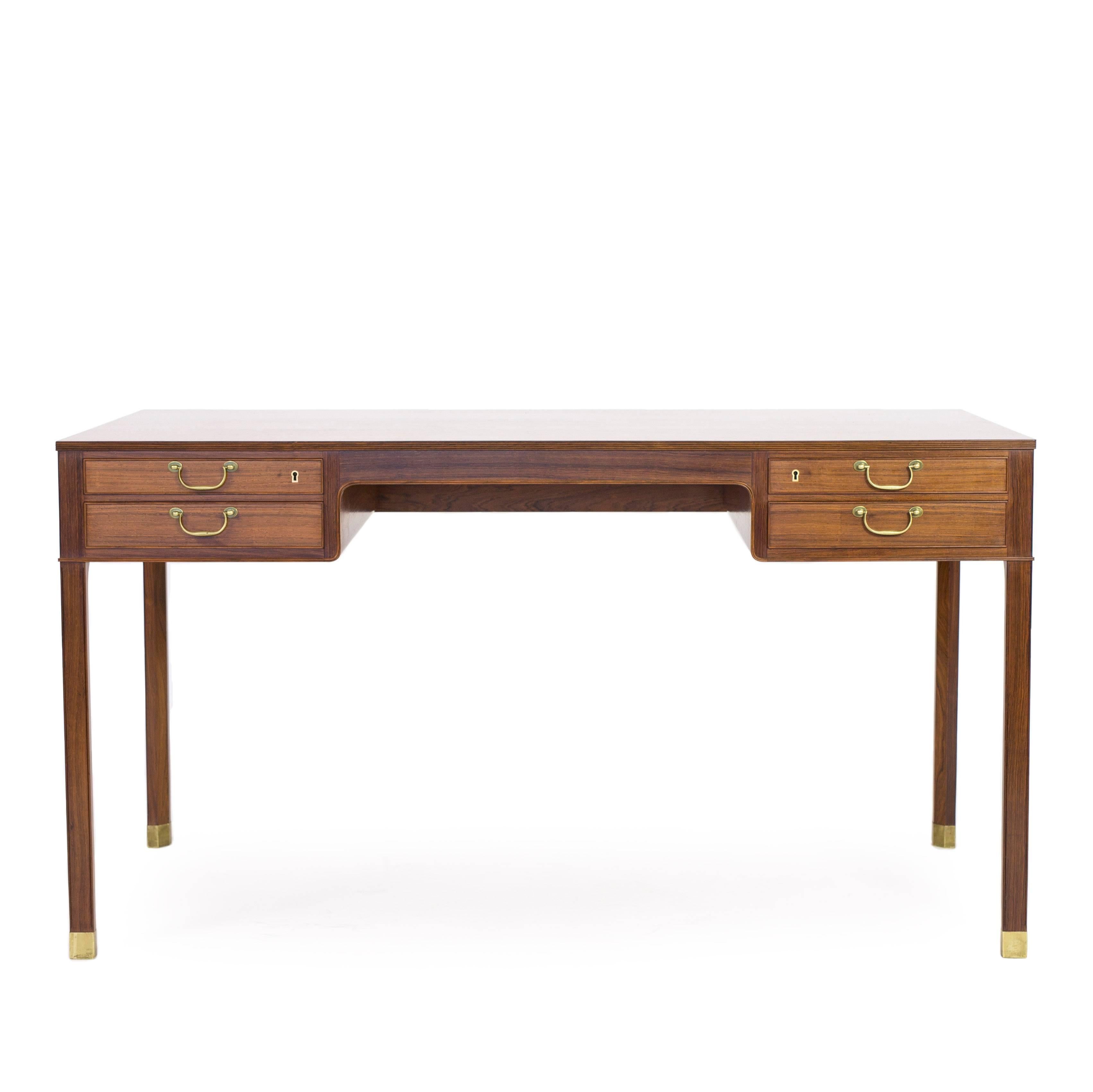 A freestanding Ole Wanscher Brazilian rosewood desk with brass fittings and profiled front.

Executed by cabinetmaker A. J. Iversen, Denmark.

Very fine condition.


 