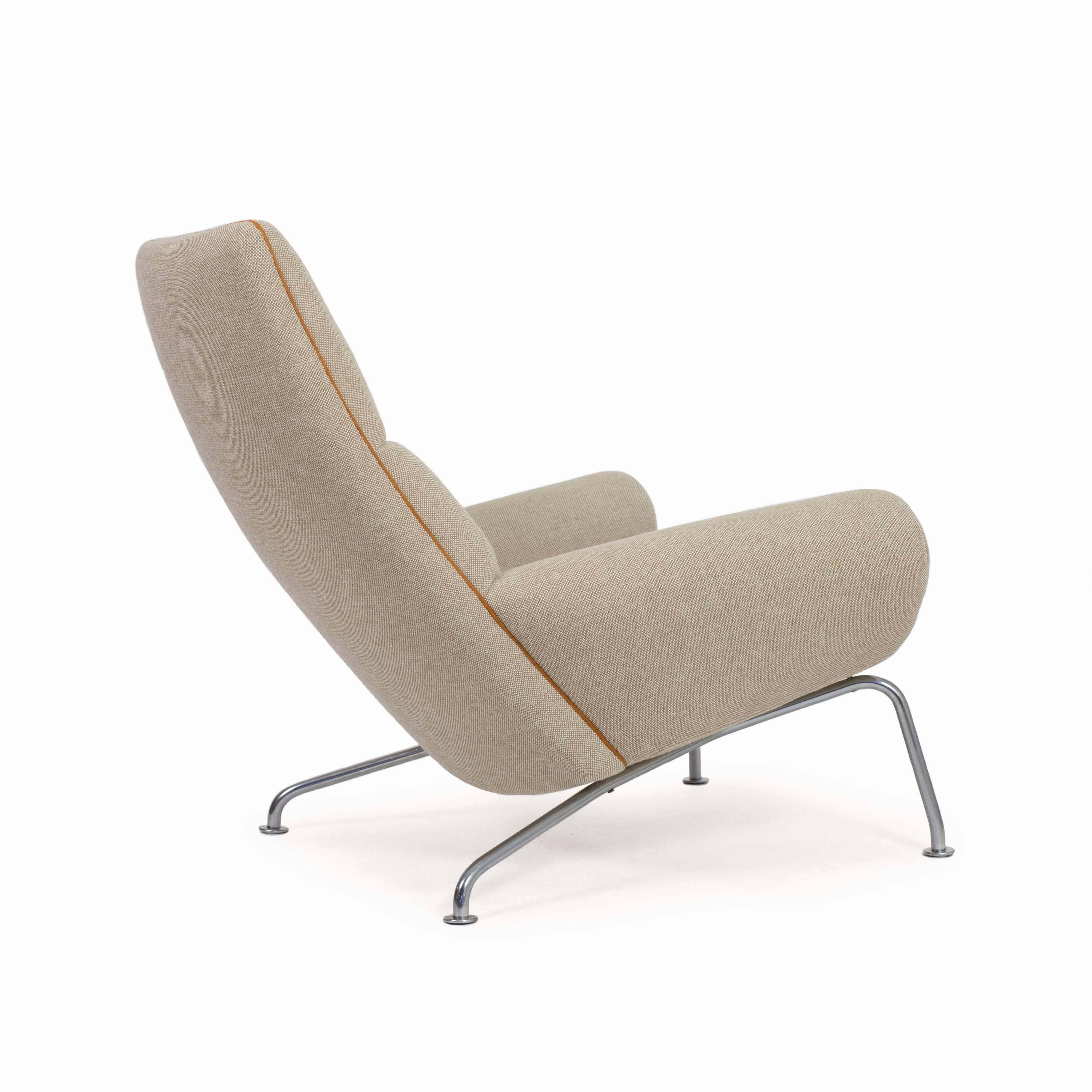 Hans J. Wegner ox chair with tubular steel frame upholstered with light fabric and leather pipings. Designed 1960 and made at AP Stolen, Denmark model AP49. 
Very fine restored condition.

Available as a pair. 
Contact Galleri Feldt for