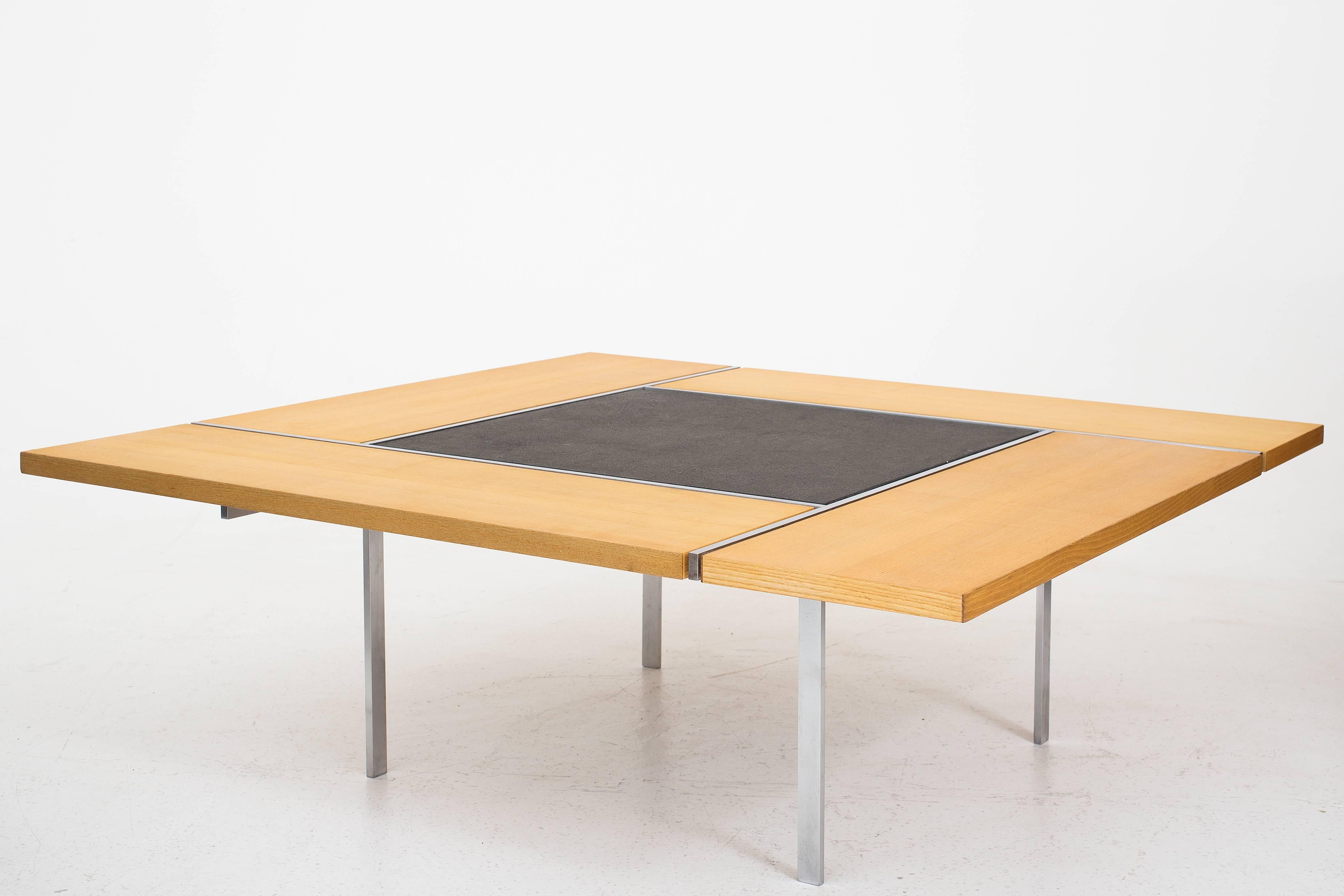 Square coffee table with steel frame. Tabletop in black slate and ash. Model BO 750. Designed by Preben Fabricius & Jørgen Kastholm. Manufactured by Bo-Ex.