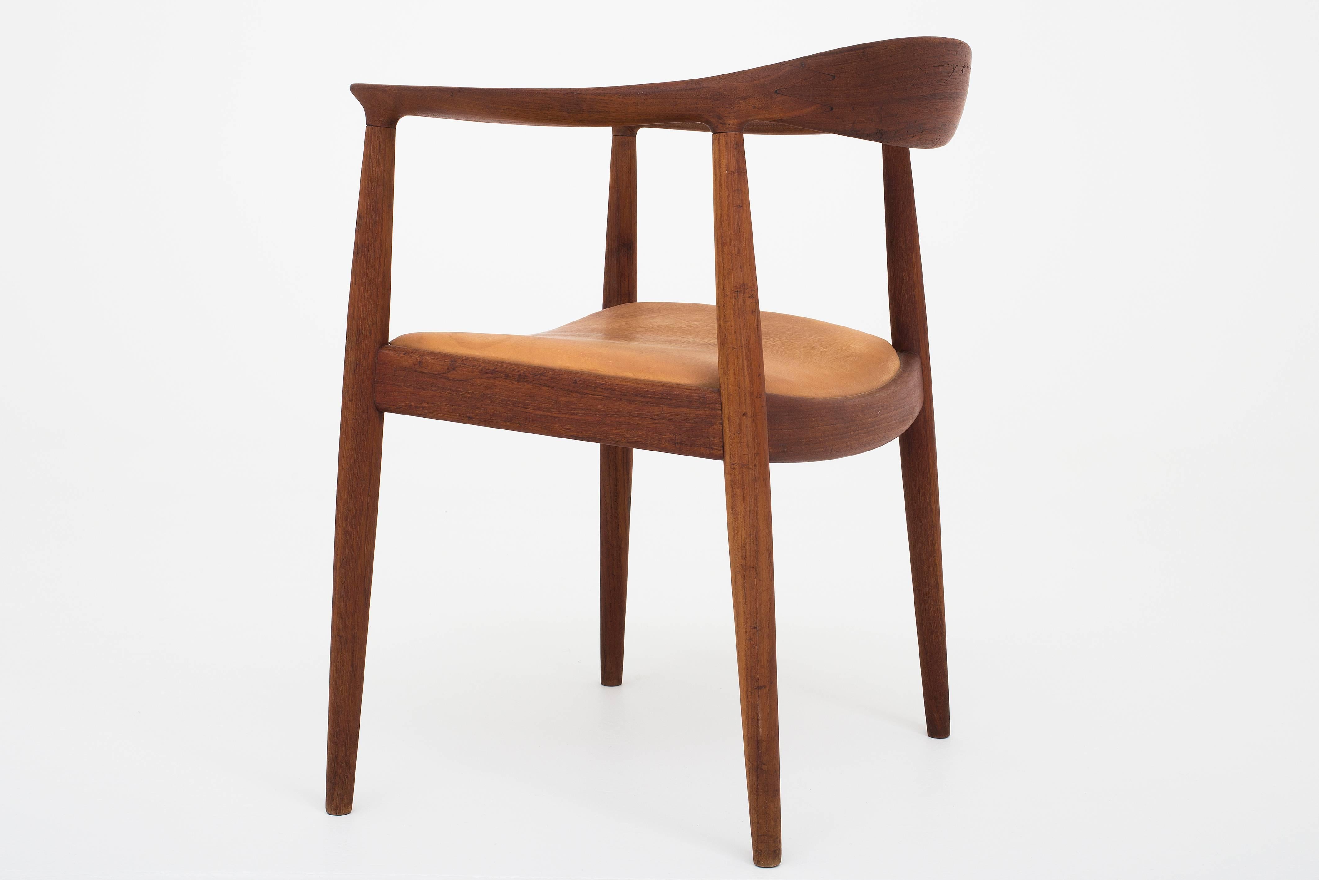 JH 503, 'The Chair' in teak and vegetal leather.