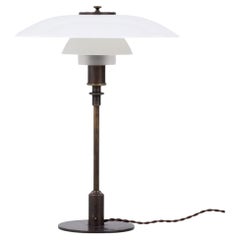 PH 3.5/2 - Table lamp in burnished brass by Poul Henningsen