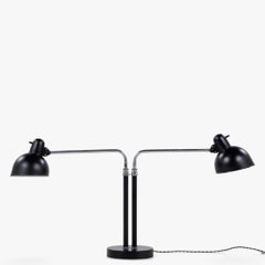 Modello 6780 - Lampada da tavolo a due bracci di Christian Dell