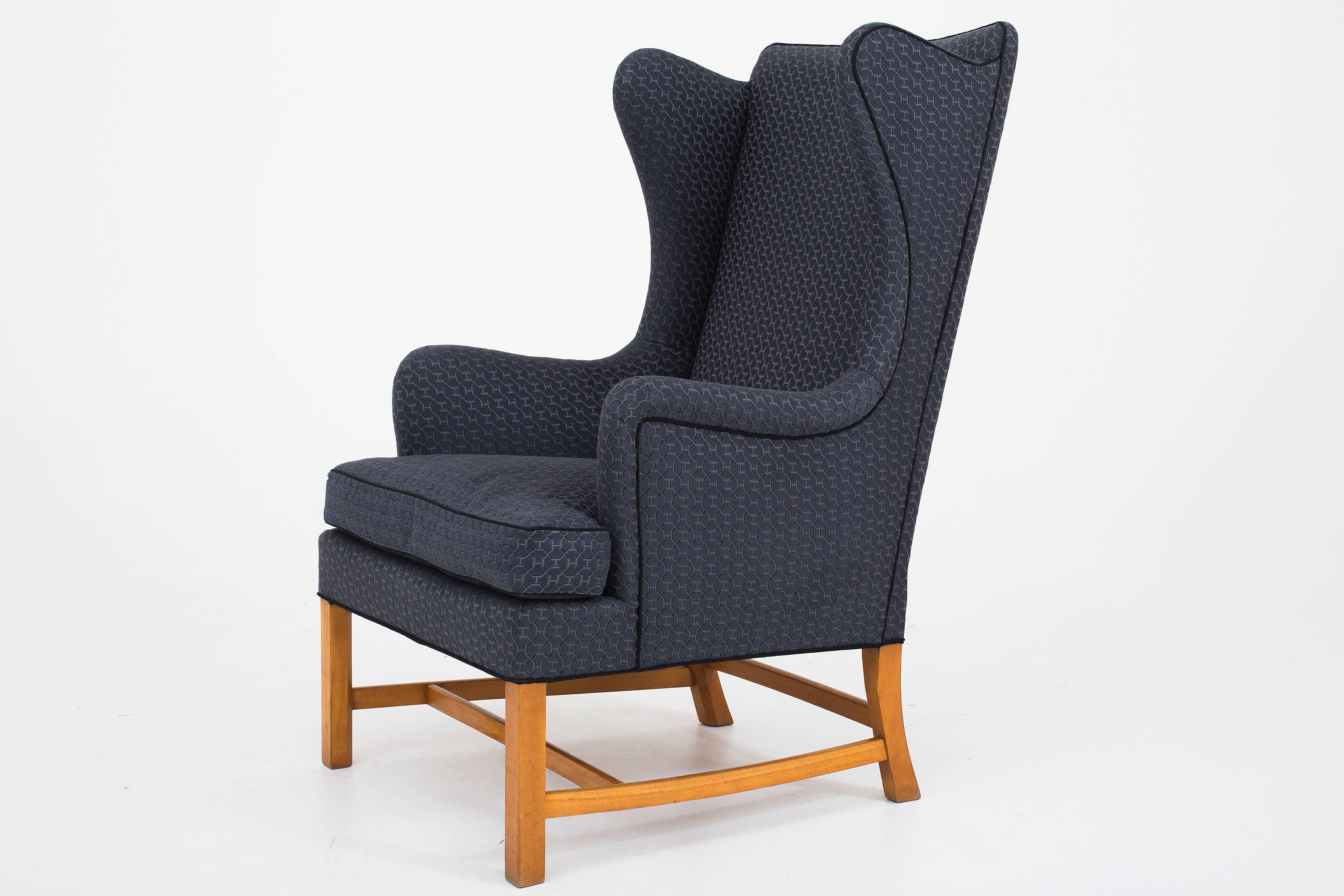 Kaare Klint wing back chair with new upholstery in Quartz Universe by Hermes, Paris and legs in mahogany. Maker Rud Rasmussen.