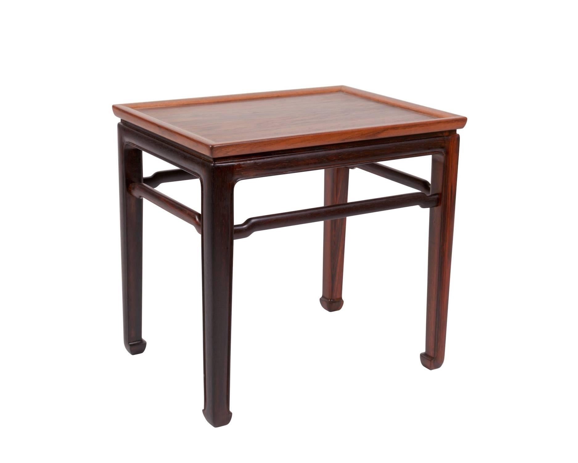 A pair of rosewood side tables in Chinese manner. 

Designed and manufactured by Jacob Kjær.