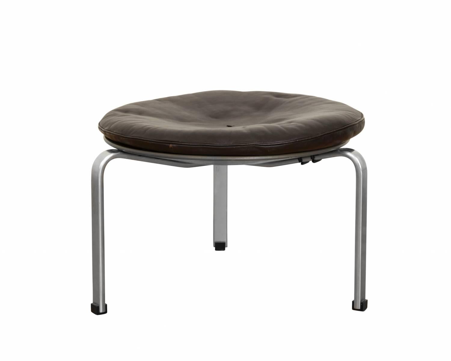 PK33 stool upholstered in black leather, frame of chromed steel. Manufactured by Kold Kristensen.

Literature: 