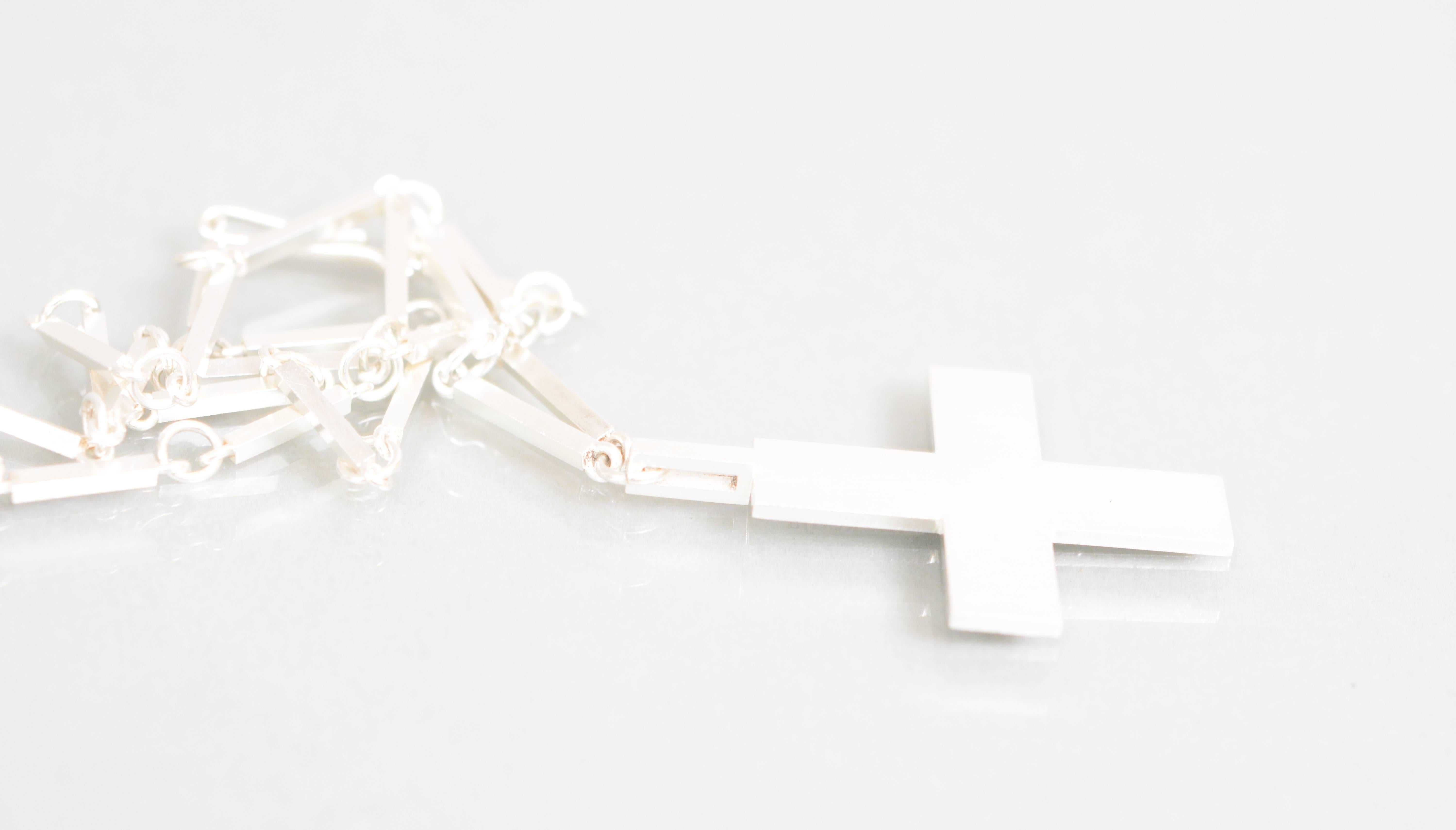 Silver necklace by Wiwen Nilsson, Lund, Sweden. Signed and dated T8 for 1945.

The cross 49 mm high and 33 mm wide.
The chain is 45 cm long.