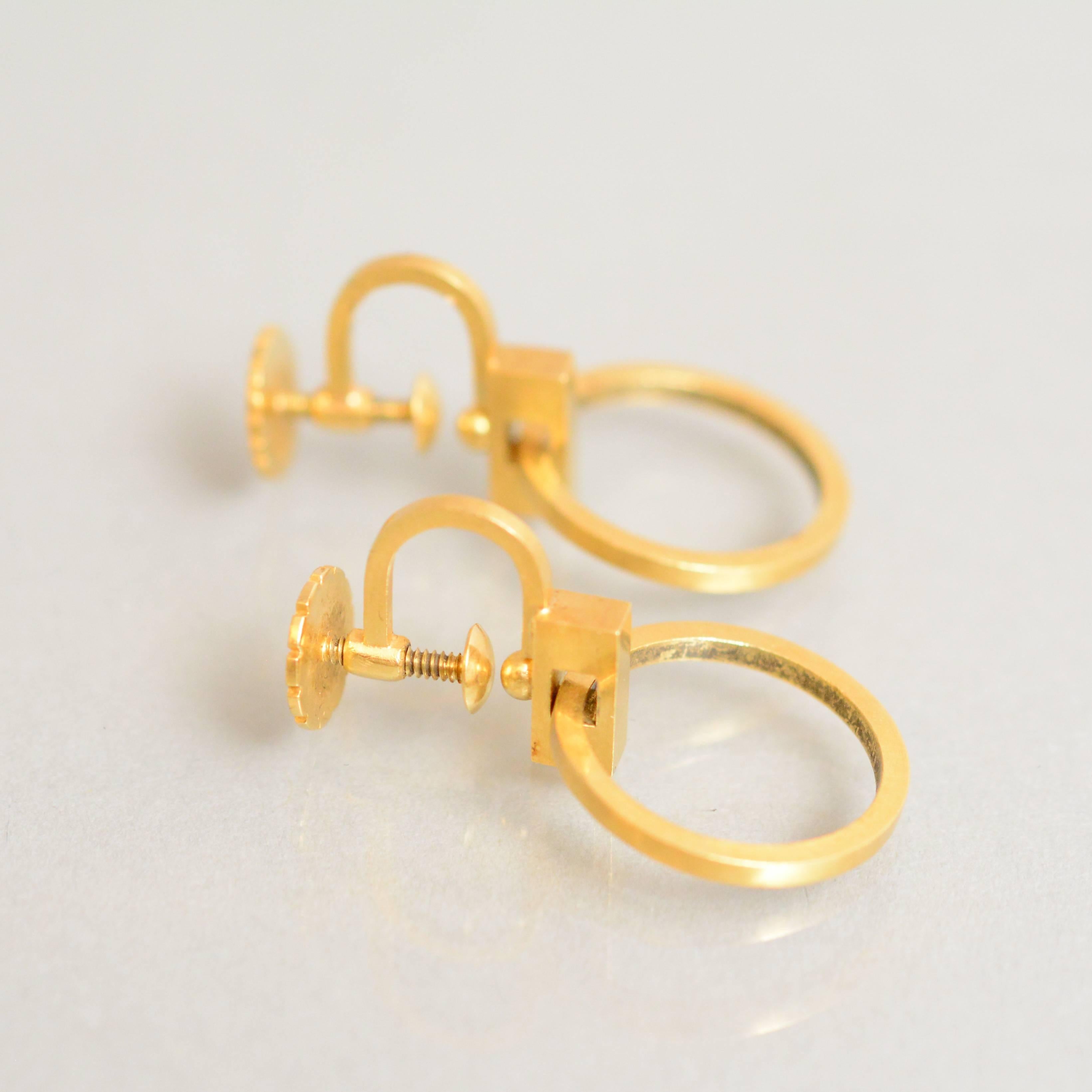 Geometrical 18-carat gold earrings by Wiwen Nilsson, Lund. Signed and dated E9 for 1955.