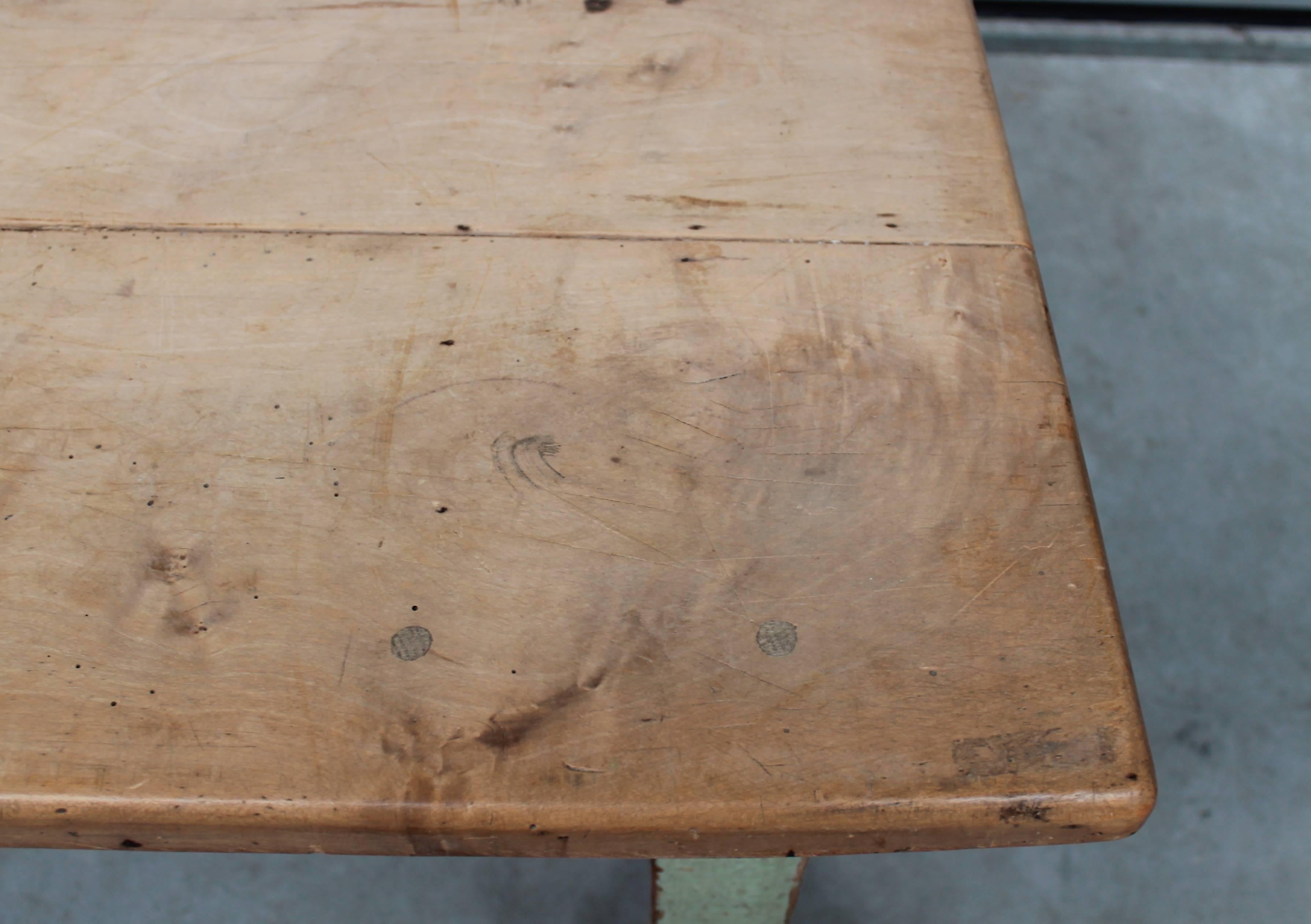 French farm table in mint green in pine with a fruitwood top.
Beautiful patina. One drawer.
