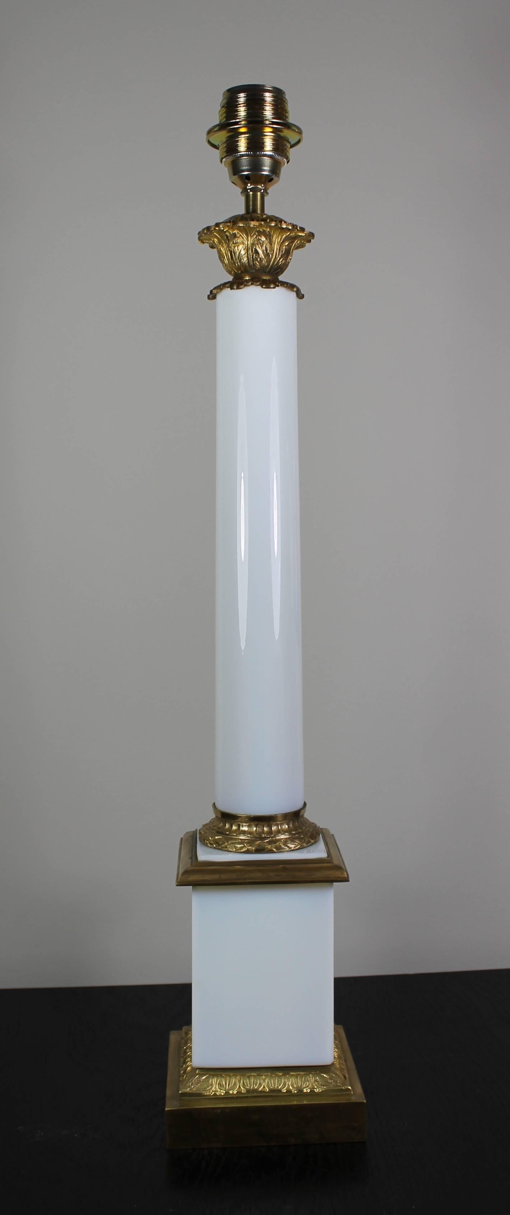 Table lamp in glass, opaline with ornaments in bronze, with a brown shade.