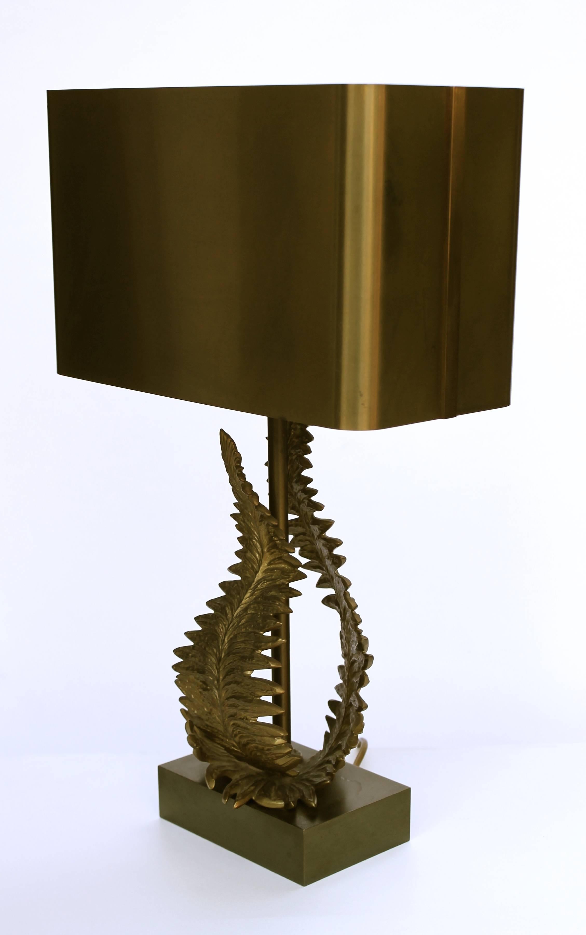 A signed Maison Charles table lamp, made of two fern leaves in bronze. The shade and the base are also in solid, patinated bronze. 
Signed: 'Charles' 'Made in France.'