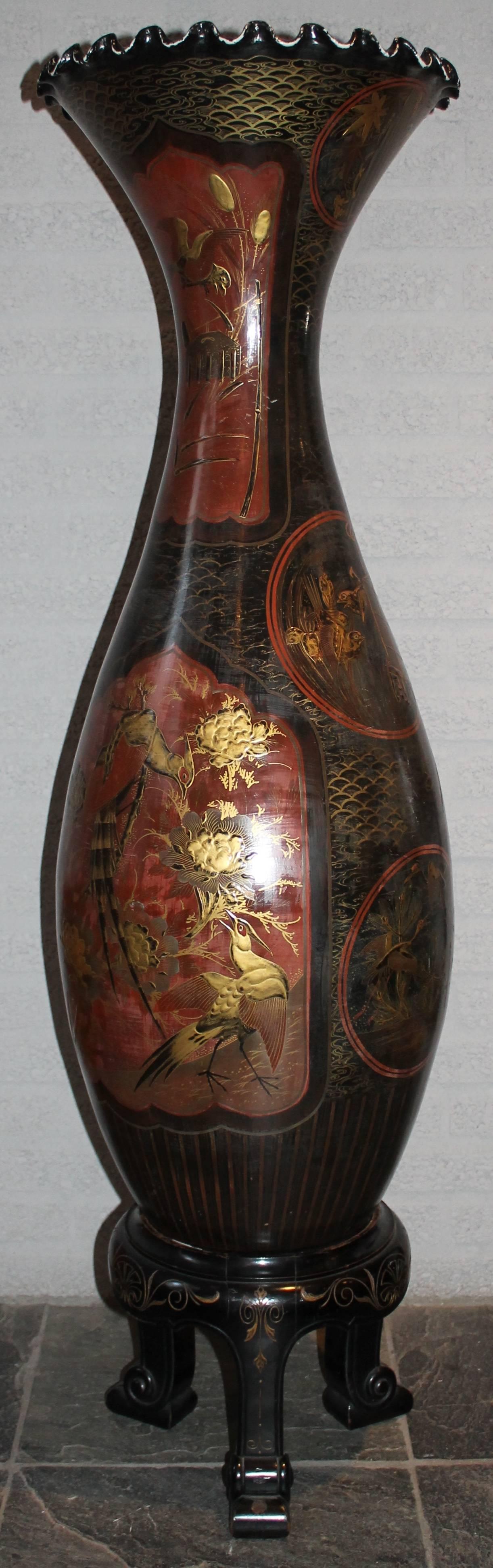 Pair of porcelain vases, Japan, circa 1900 (Meiji: 1868-1912), in black, red and gold.
  