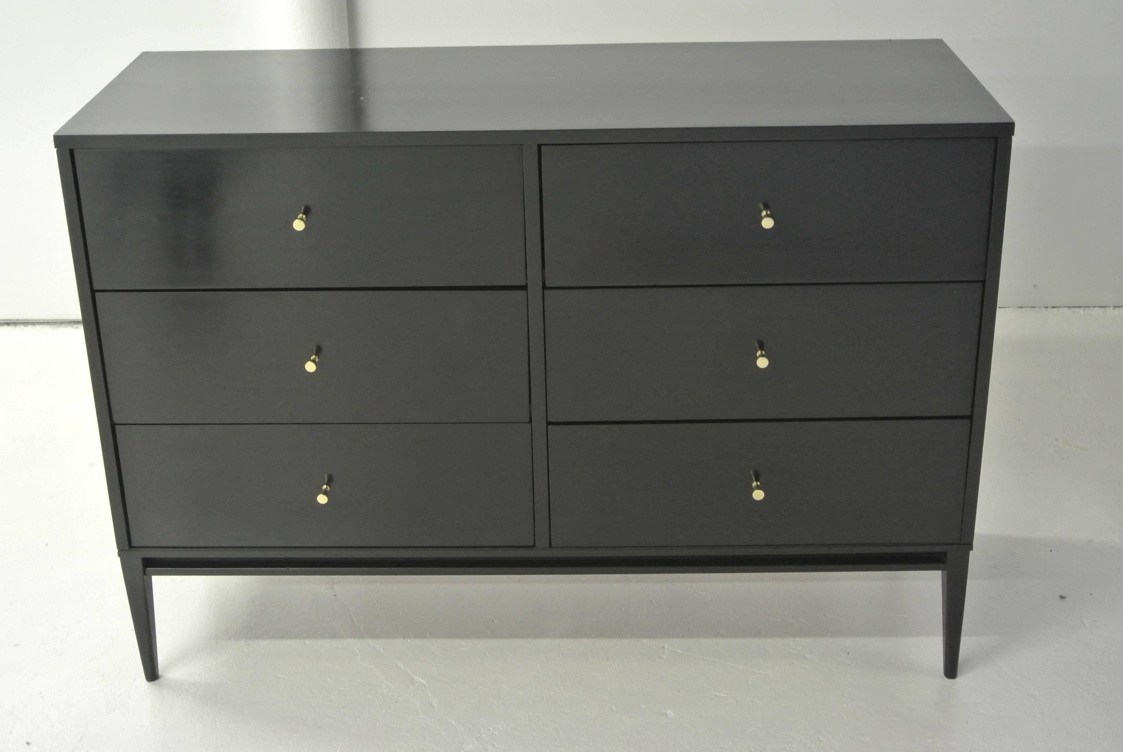 Newly refinished six-drawer bresser by Paul McCobb for Winchendon Furniture. Features brass conical pulls 
