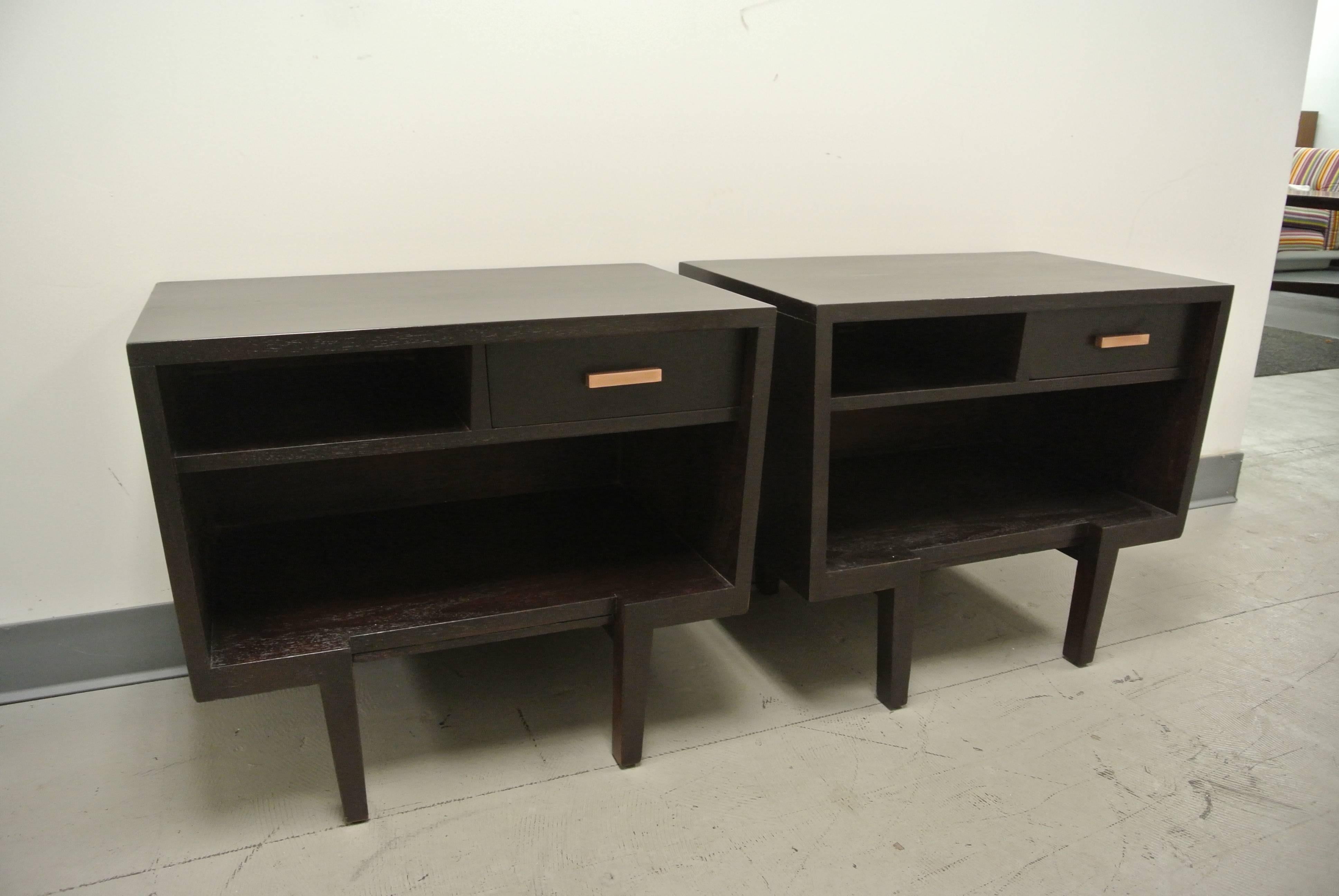 Pair of Nightstands by Grosfeld House. Each has two compartments along with a singular drawer w. copper pull and pull out lower tray