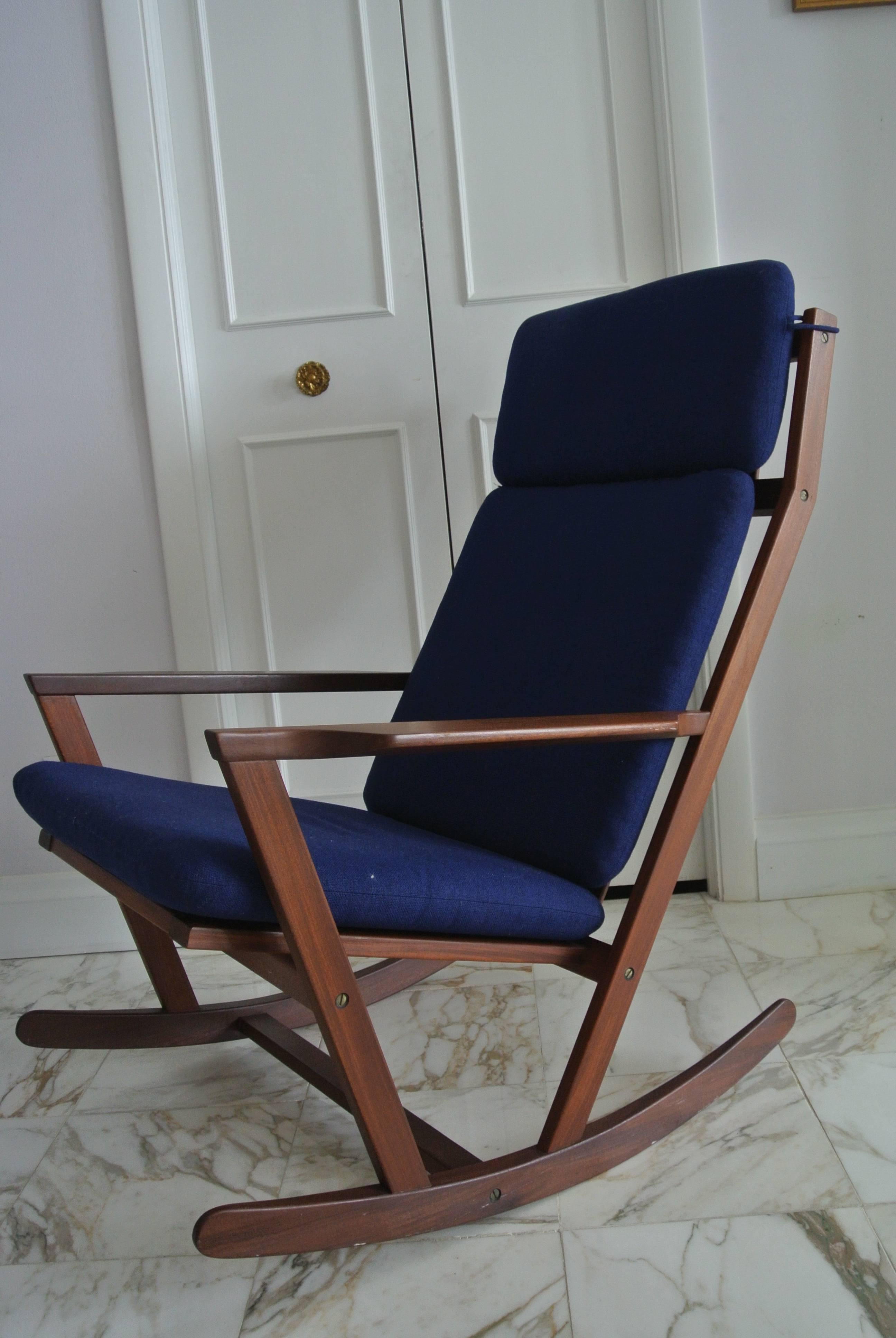 Beautiful teak rocking chair by Poul Volther for Frem Rojle. Original Naugahyde upholstered cushion.