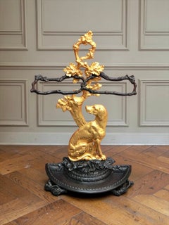 A Victorian cast-iron and gilt dog umbrella stand Late 19th century – English